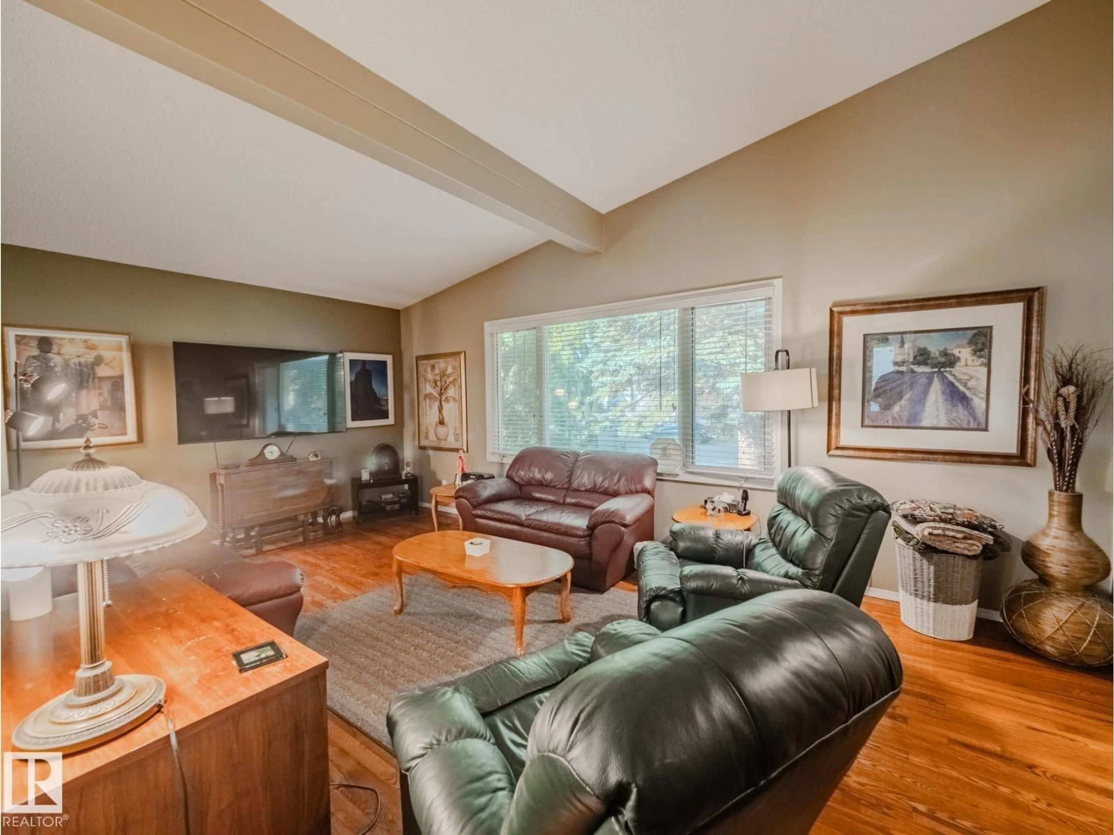 Living room with furniture, wood/laminate floor for 50 FLAGSTONE CR, St. Albert Alberta T8N1R3