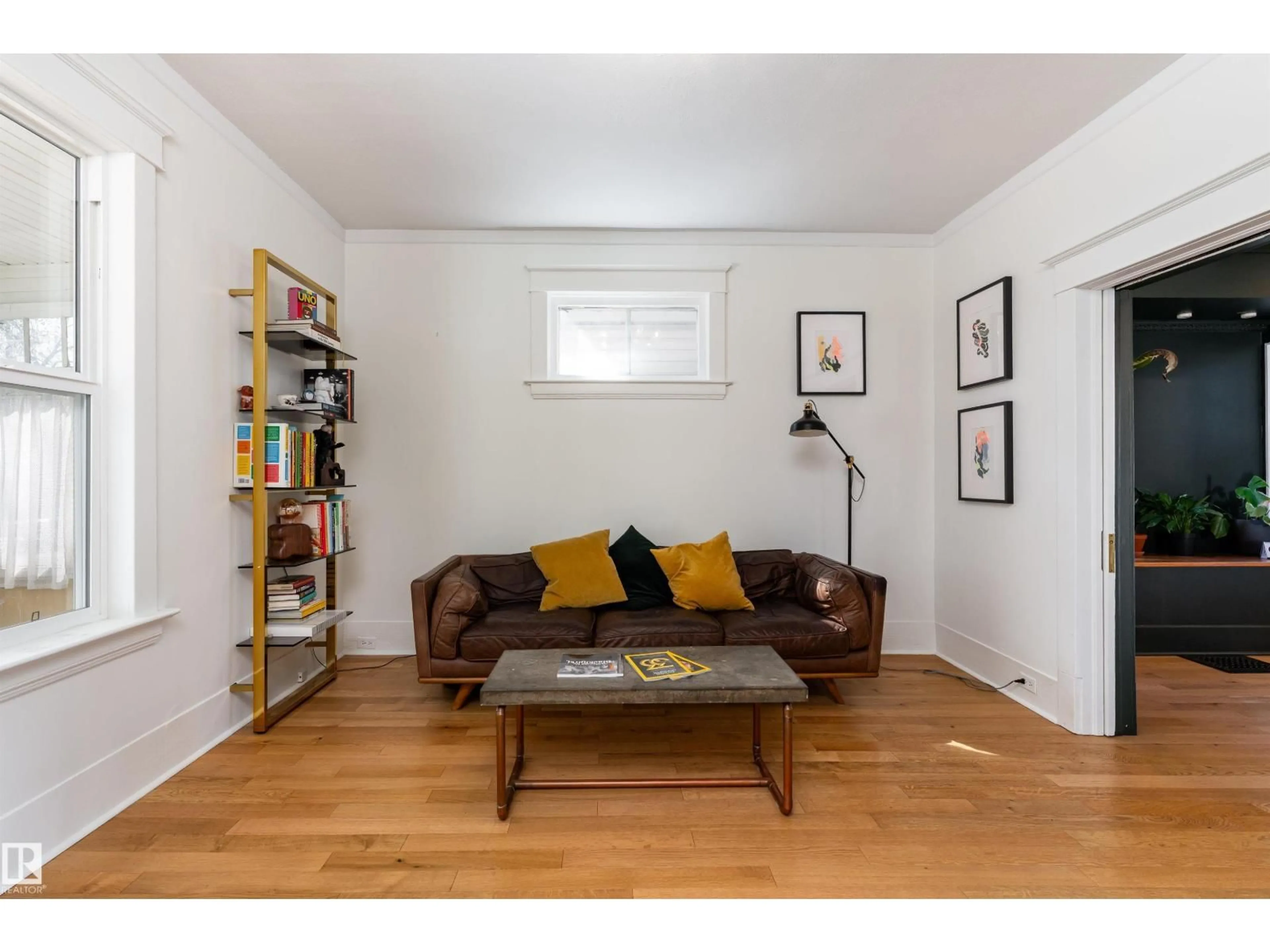 Living room with furniture, wood/laminate floor for NW - 11216 91 ST, Edmonton Alberta T5B4A2