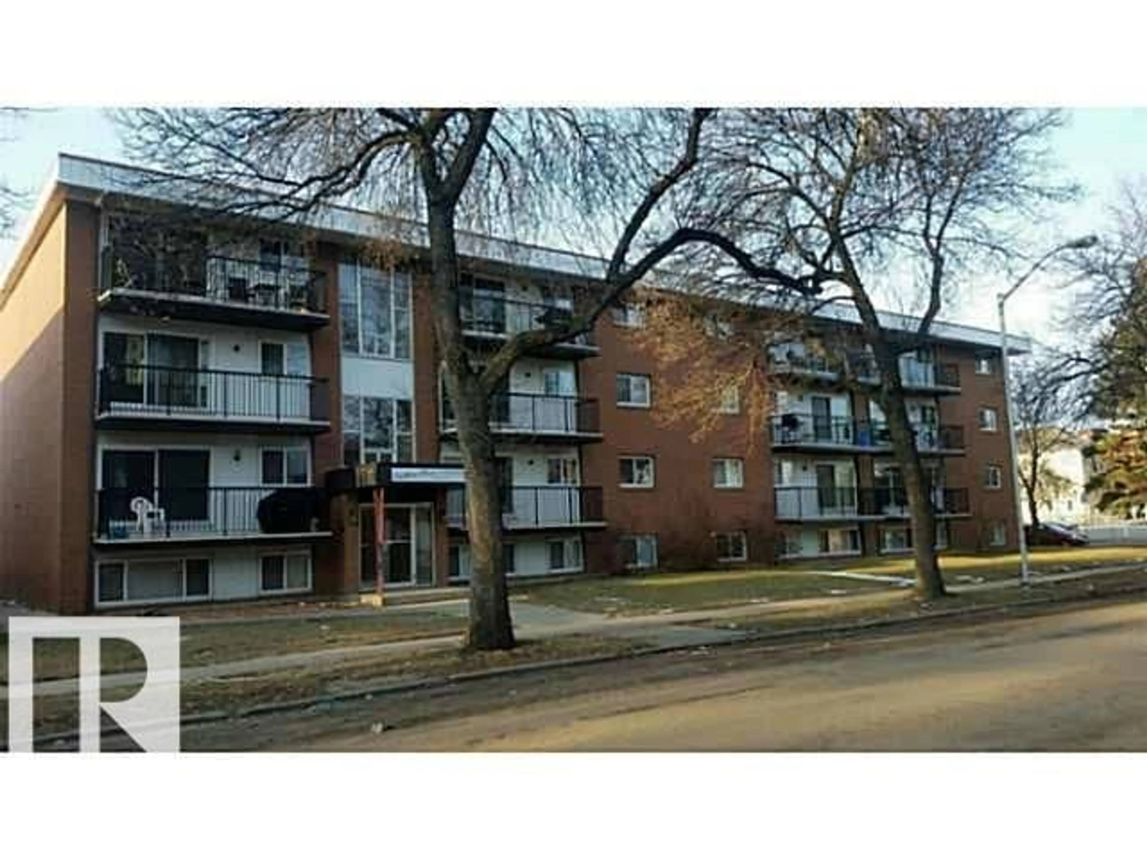 A pic from outside/outdoor area/front of a property/back of a property/a pic from drone, street for #105 - 10149 83 AV, Edmonton Alberta T6E2C5
