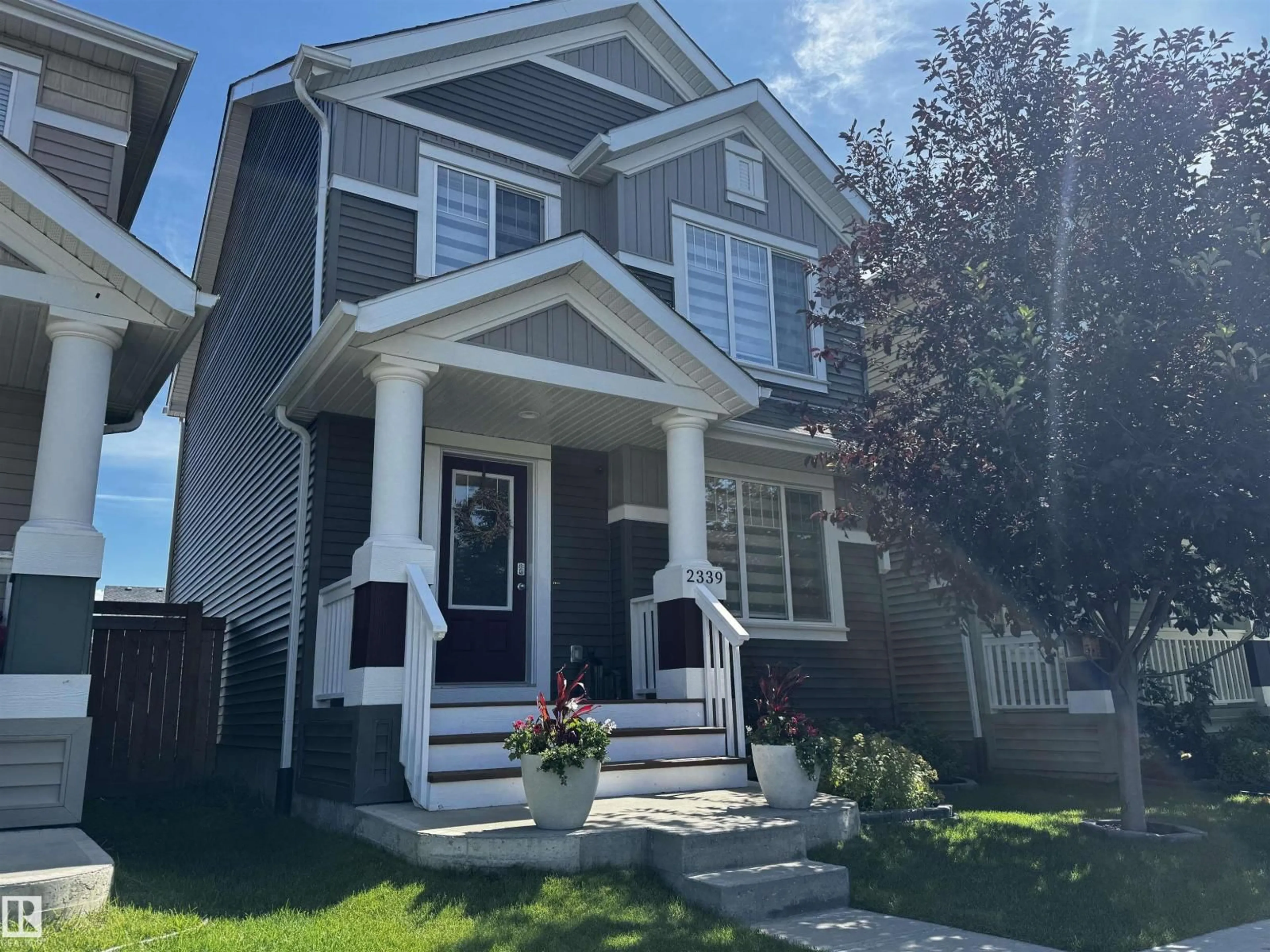 Home with vinyl exterior material, street for SW - 2339 83 ST, Edmonton Alberta T6X2G8