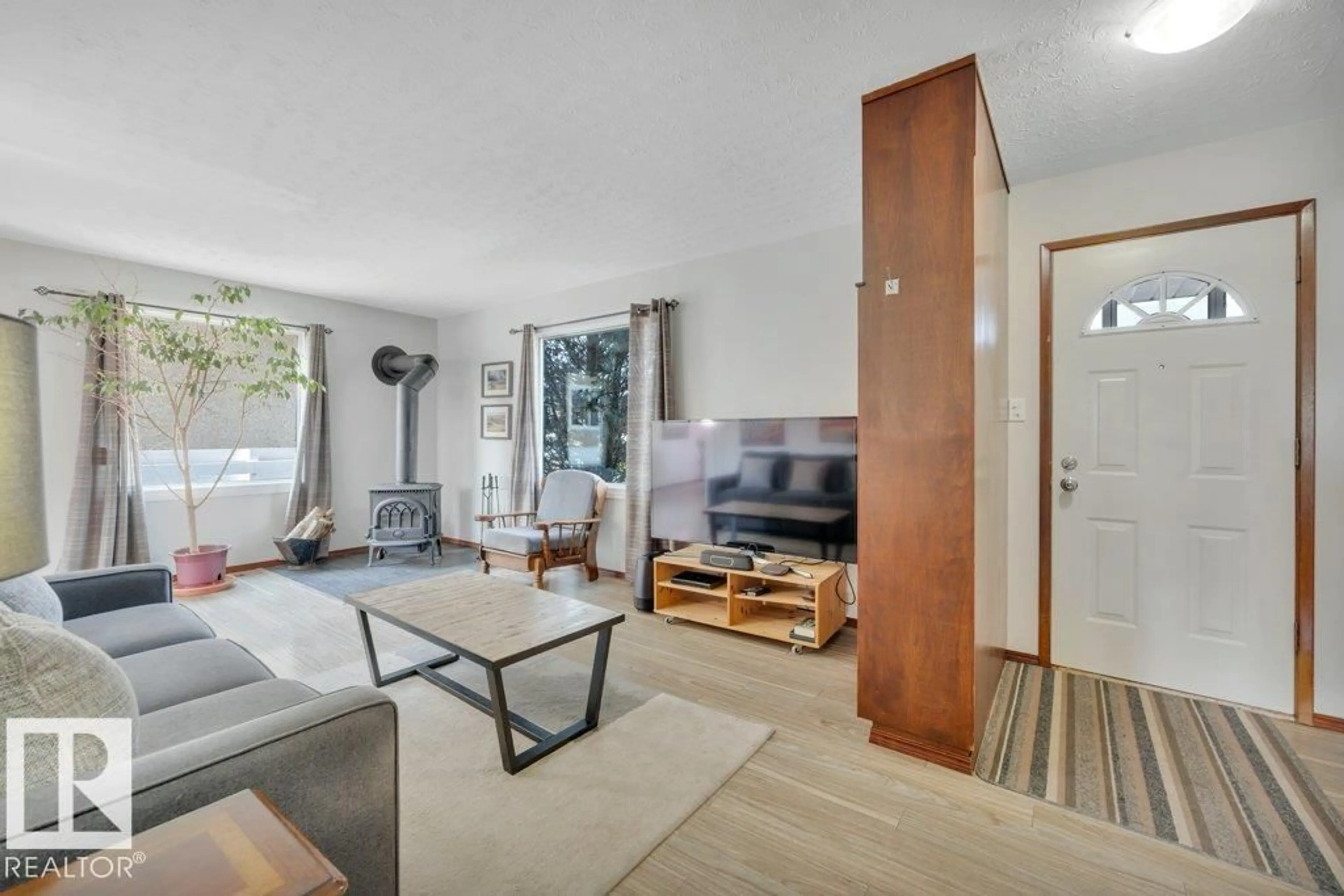Living room with furniture, unknown for 11311 43 AV, Edmonton Alberta T6J0X9