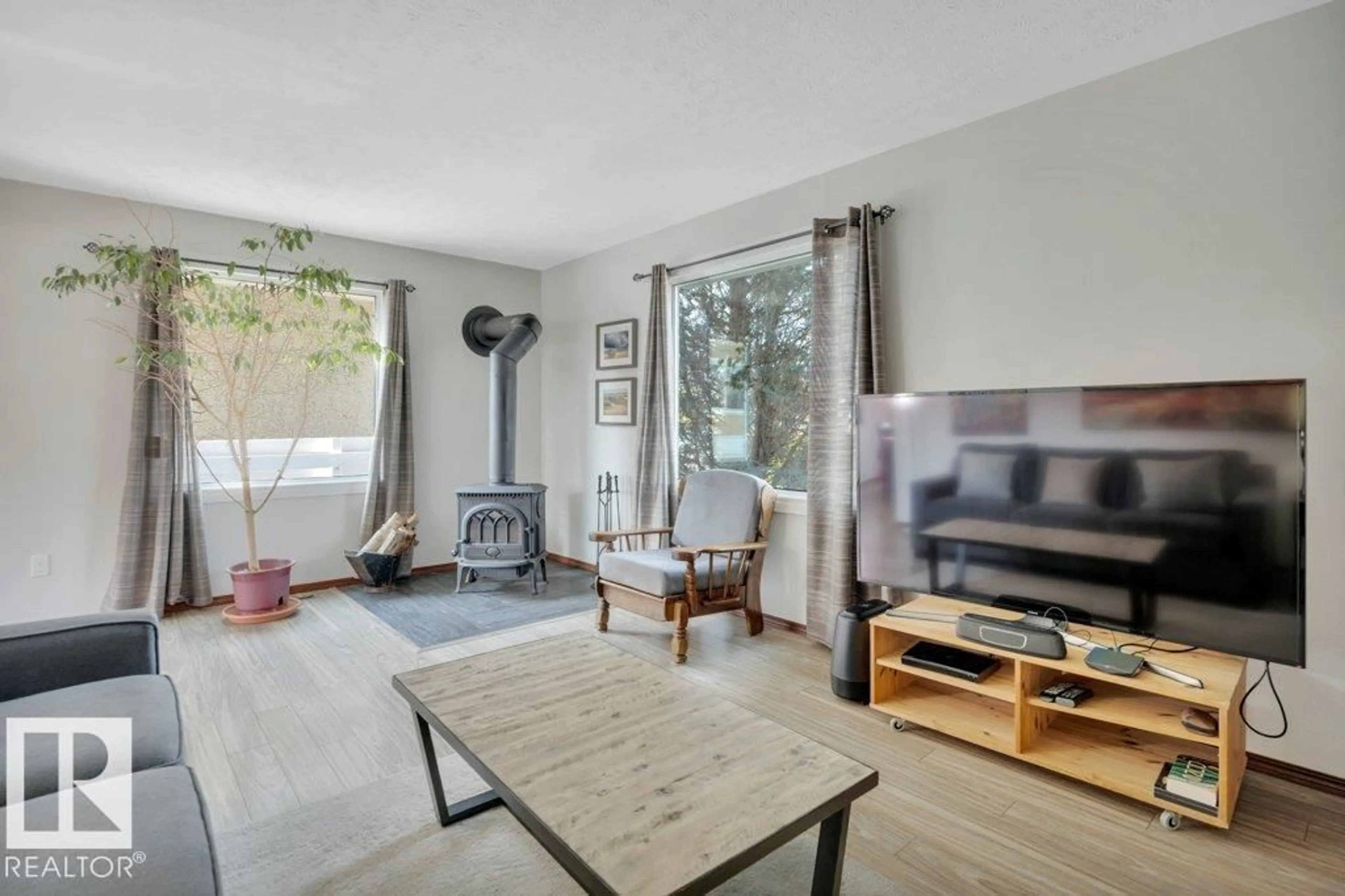Living room with furniture, unknown for 11311 43 AV, Edmonton Alberta T6J0X9