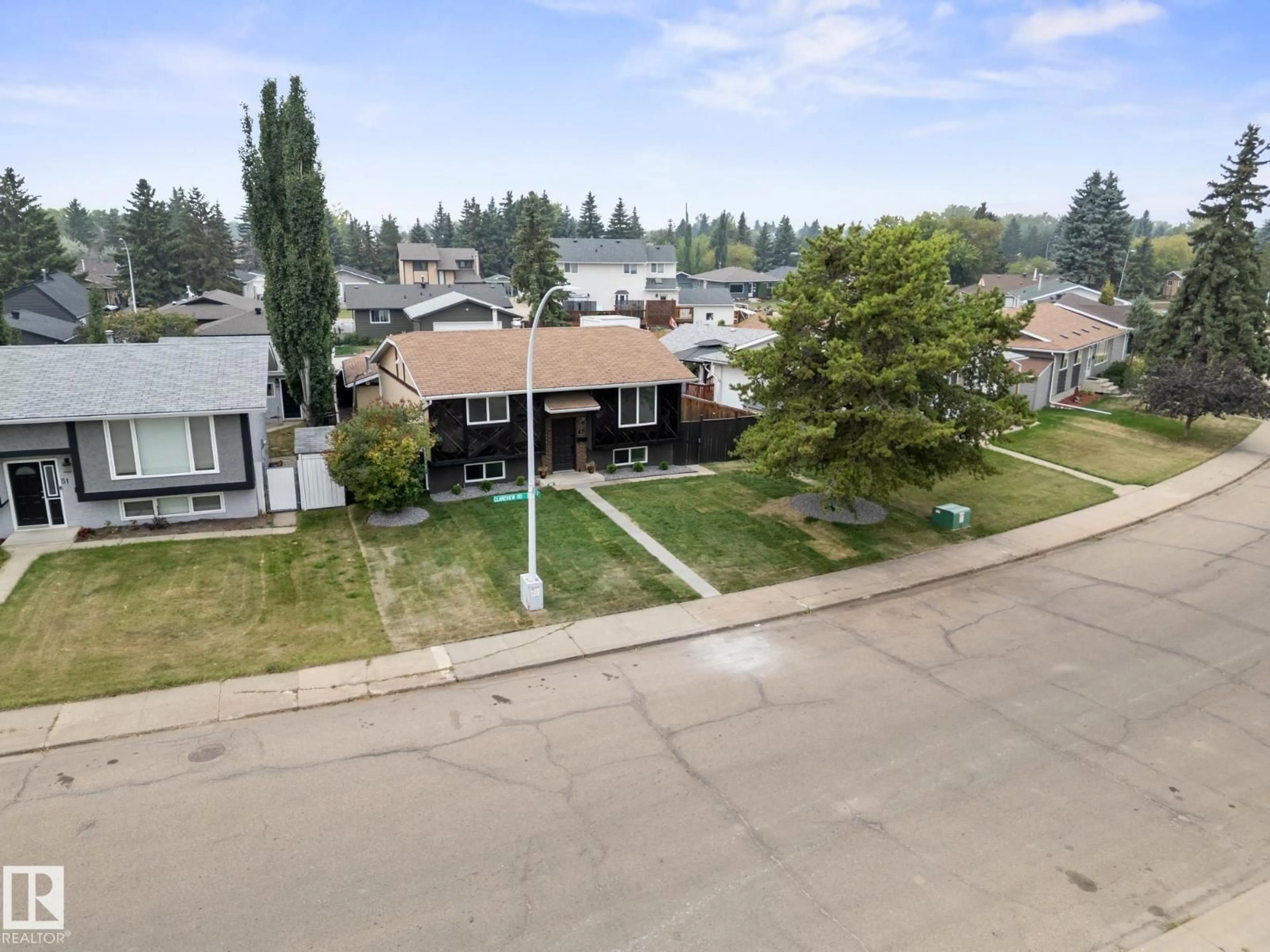 A pic from outside/outdoor area/front of a property/back of a property/a pic from drone, street for 47 CLAREVIEW RD, Edmonton Alberta T5A3X2