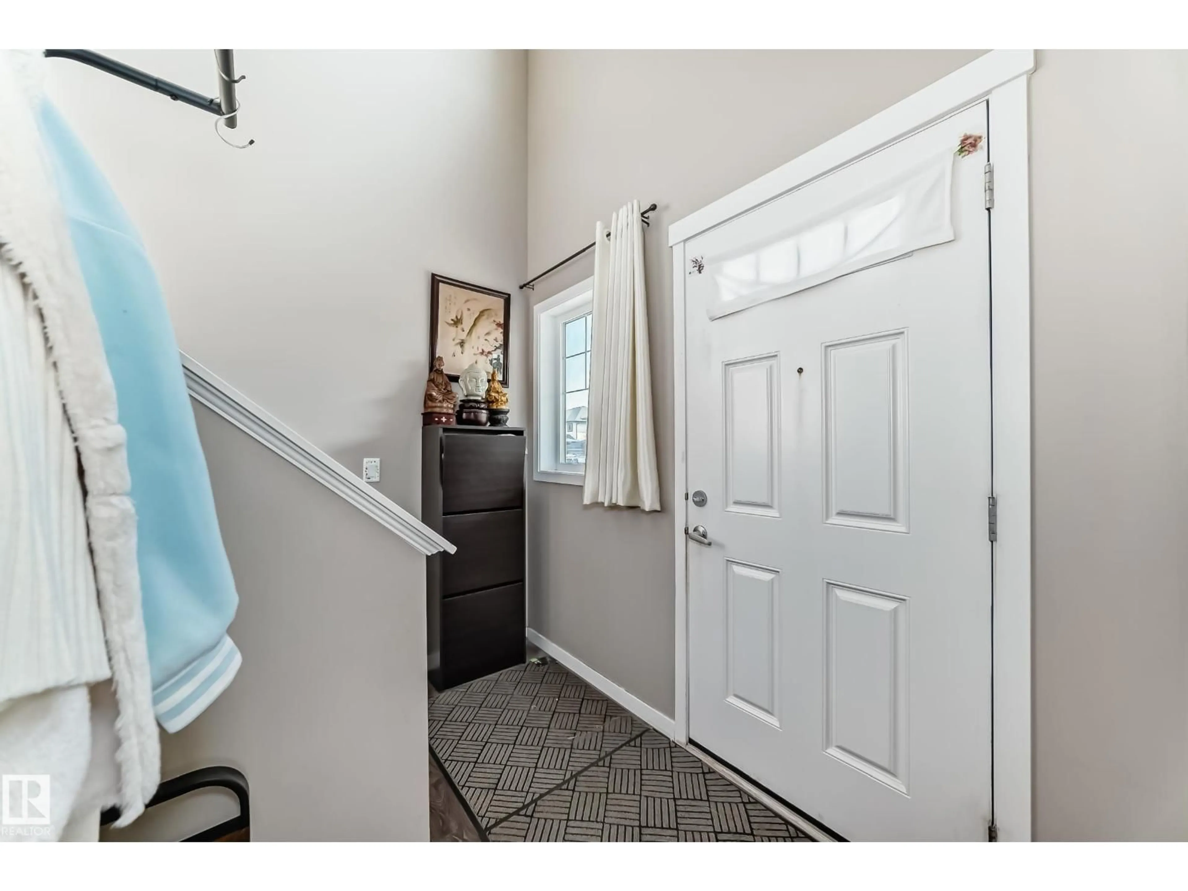 Indoor entryway for 1426 26 AV, Edmonton Alberta T6T0W1