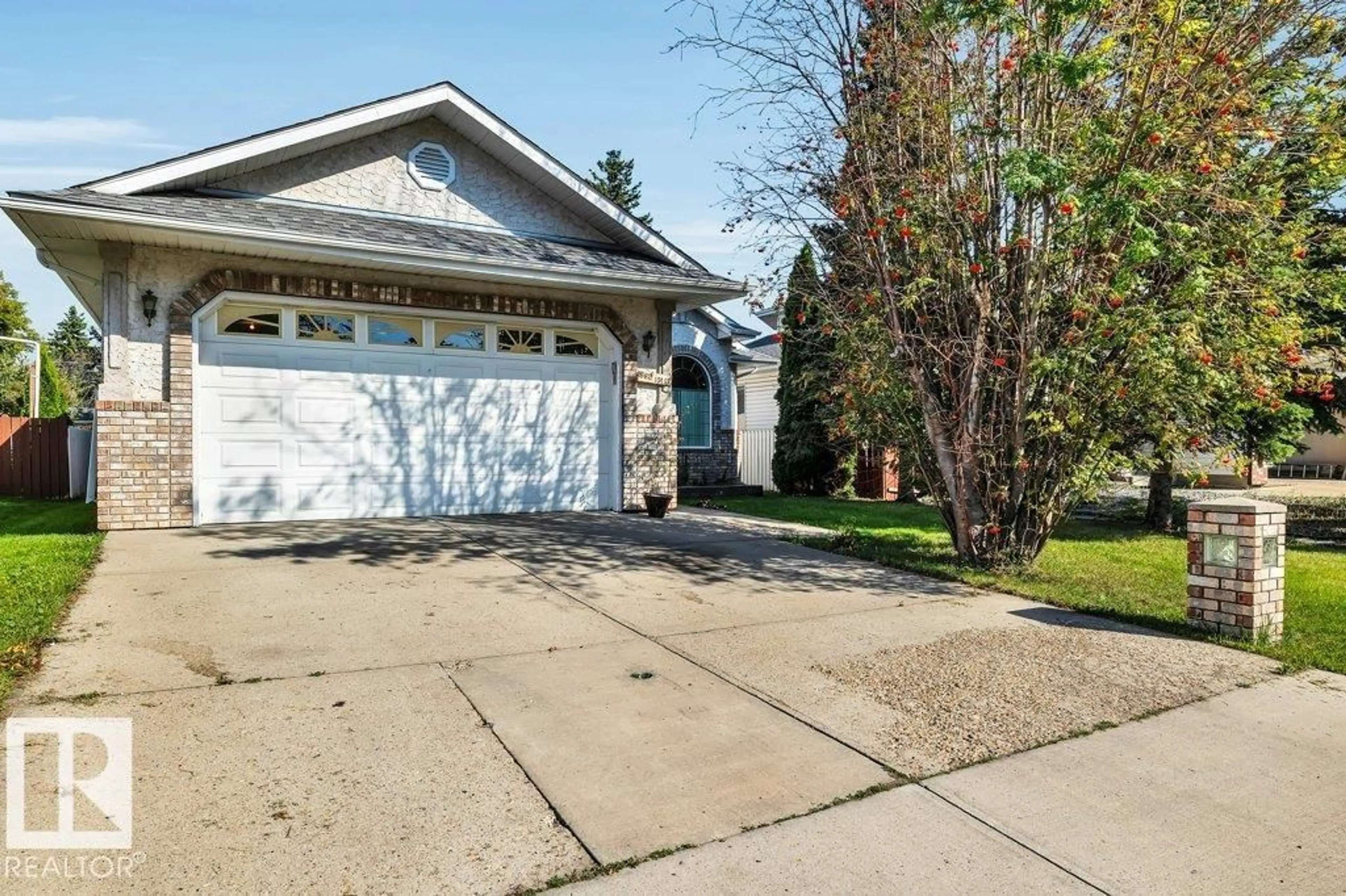 Home with vinyl exterior material, street for 9811 151 ST, Edmonton Alberta T5P1S9