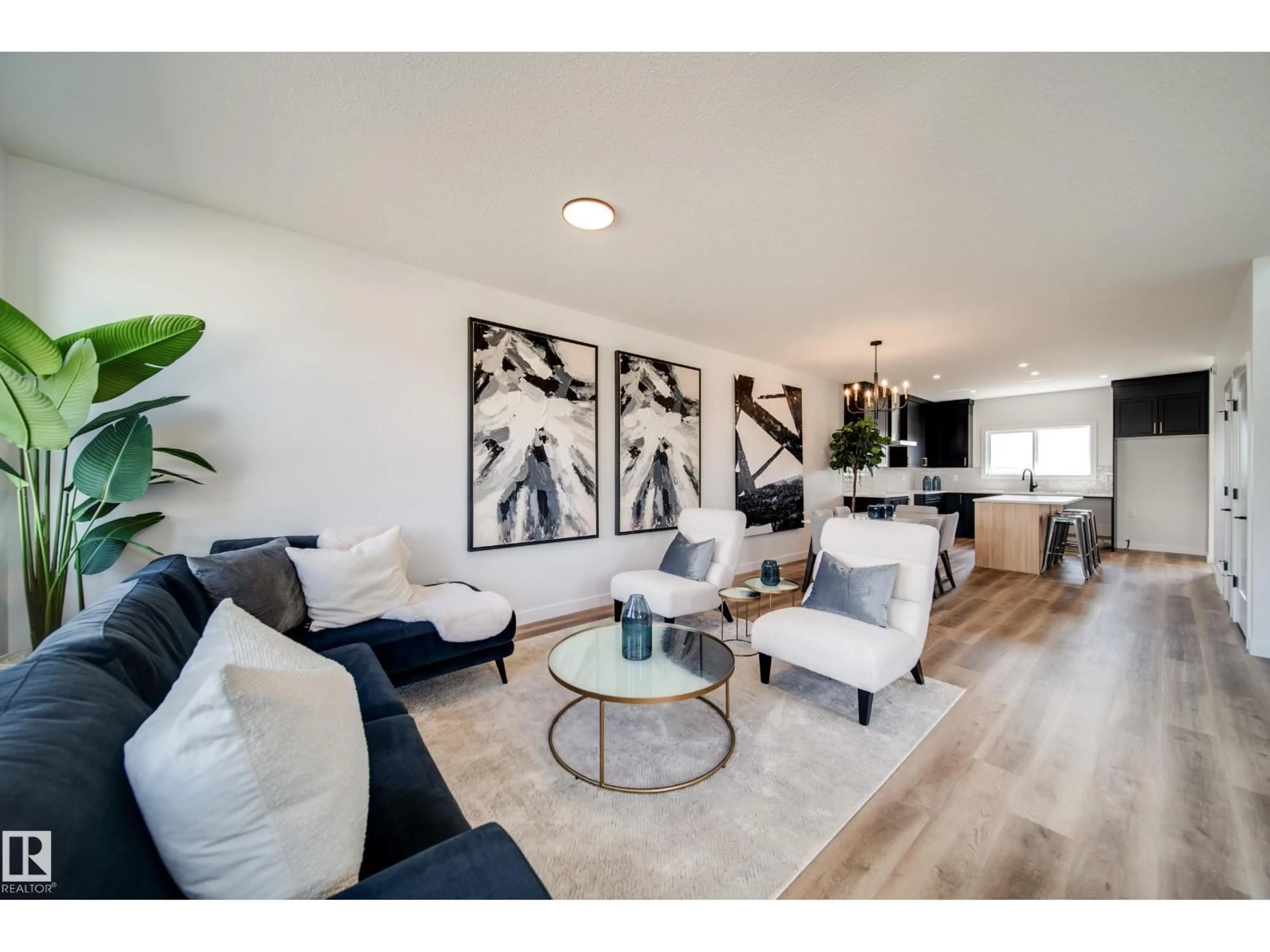 Living room with furniture, wood/laminate floor for 63 SIENNA BV, Fort Saskatchewan Alberta T8L0W3