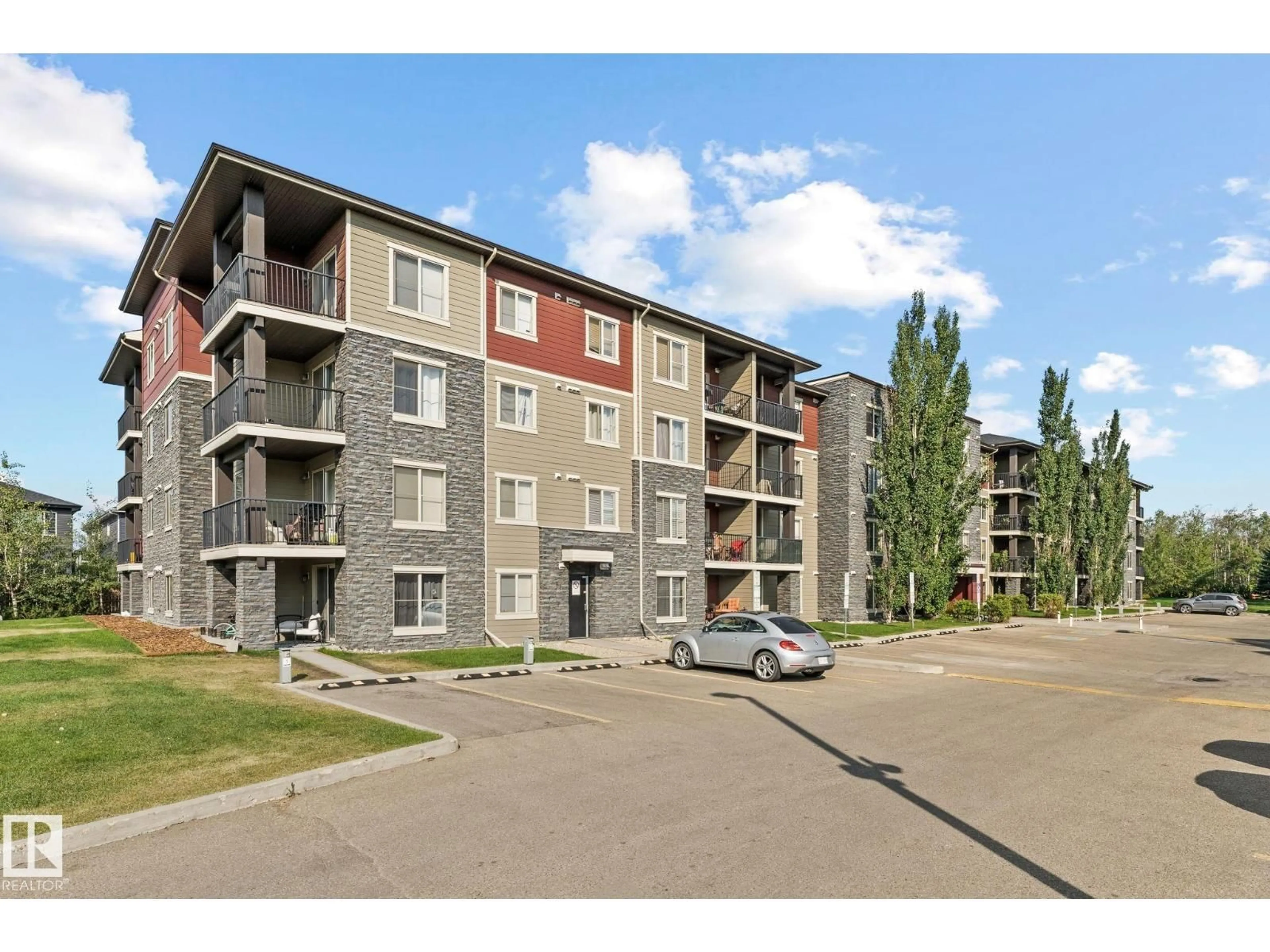 A pic from outside/outdoor area/front of a property/back of a property/a pic from drone, unknown for 407 - 1060 MCCONACHIE BV, Edmonton Alberta T5Y0V1