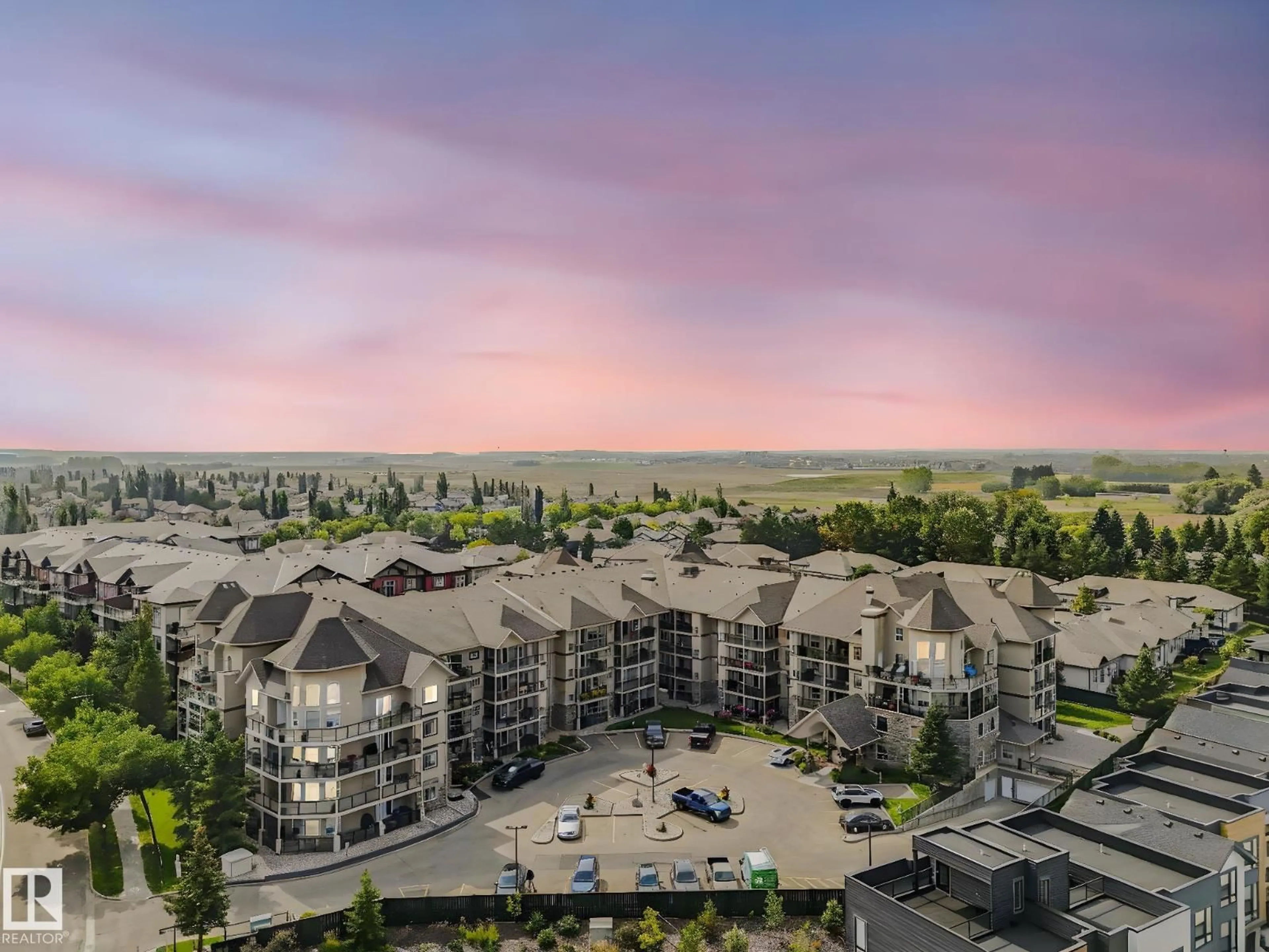 A pic from outside/outdoor area/front of a property/back of a property/a pic from drone, mountain view for #103 - 1320 RUTHERFORD RD, Edmonton Alberta T6W0B6