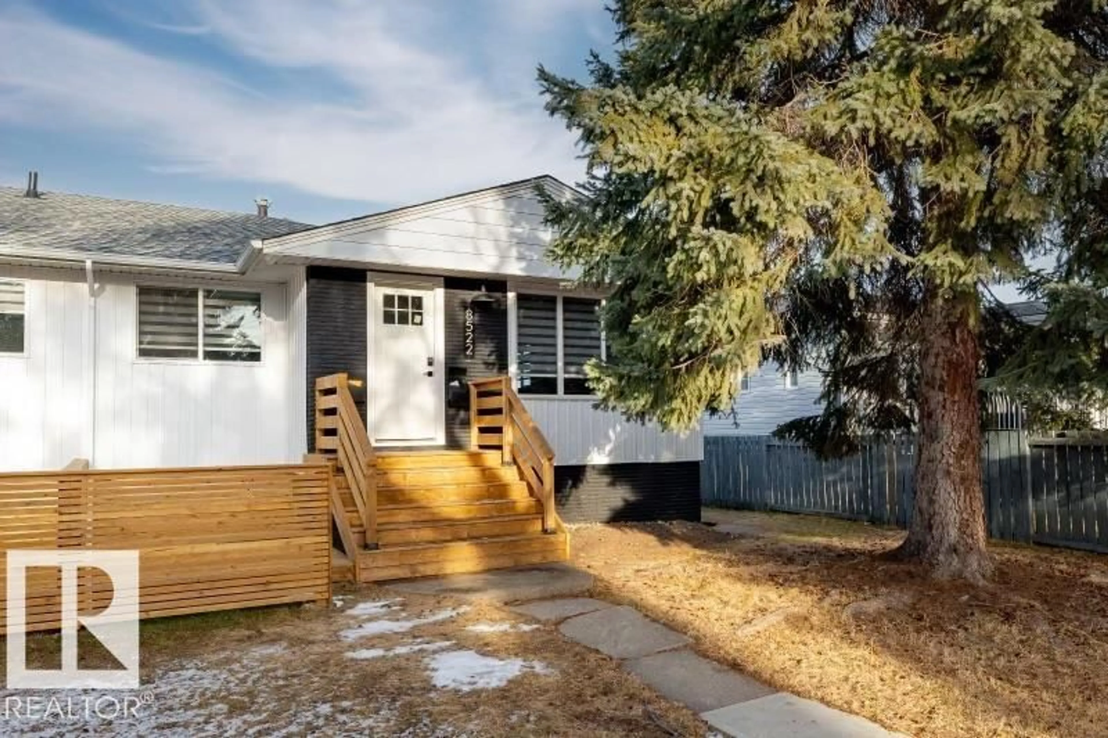 Home with vinyl exterior material, street for 8522 84 AV, Edmonton Alberta T6C1C9