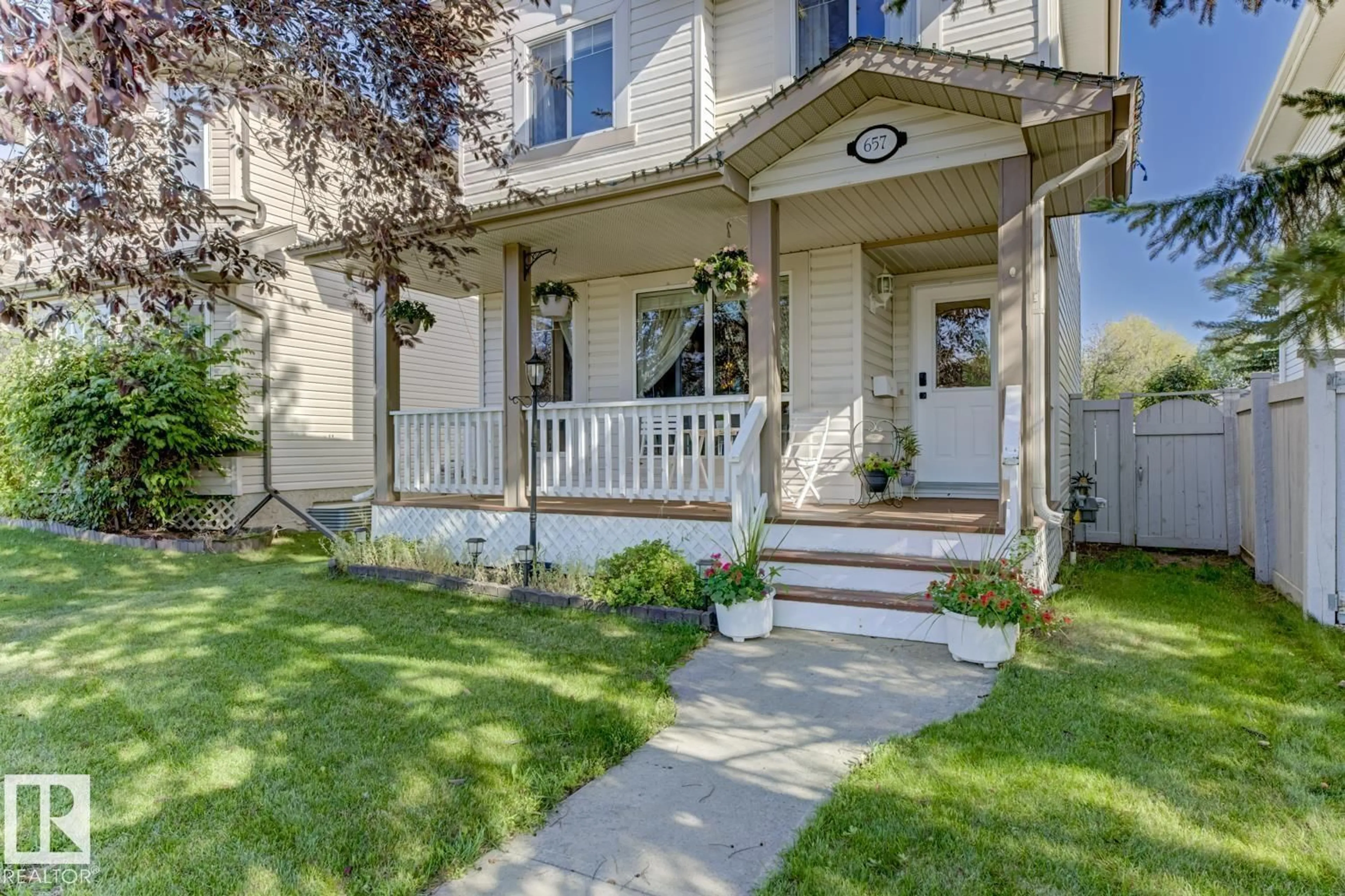 Home with vinyl exterior material, street for 657 GLENWRIGHT CR, Edmonton Alberta T5T6K6