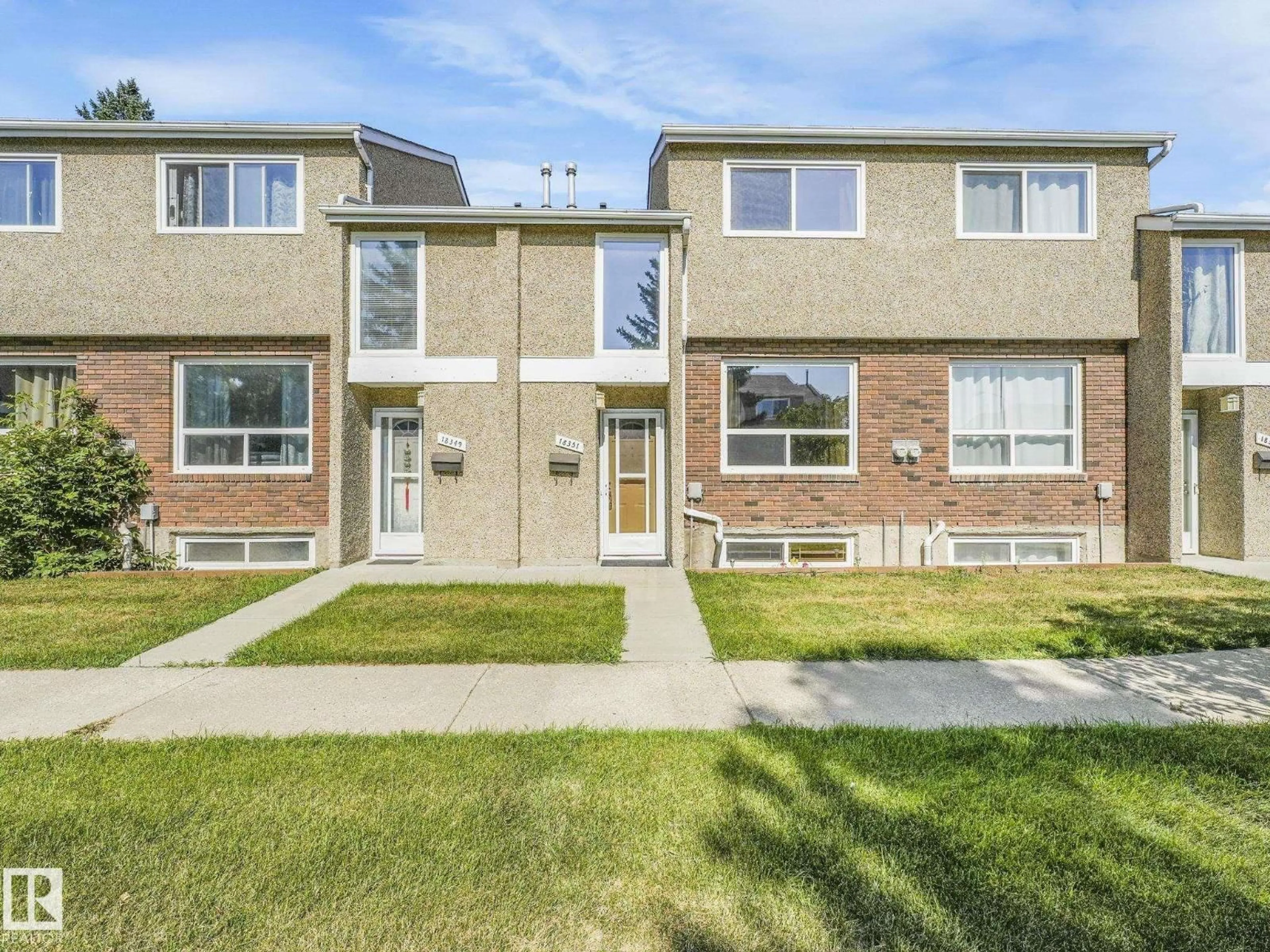 Home with brick exterior material, street for 18351 93 AV, Edmonton Alberta T5T1V2