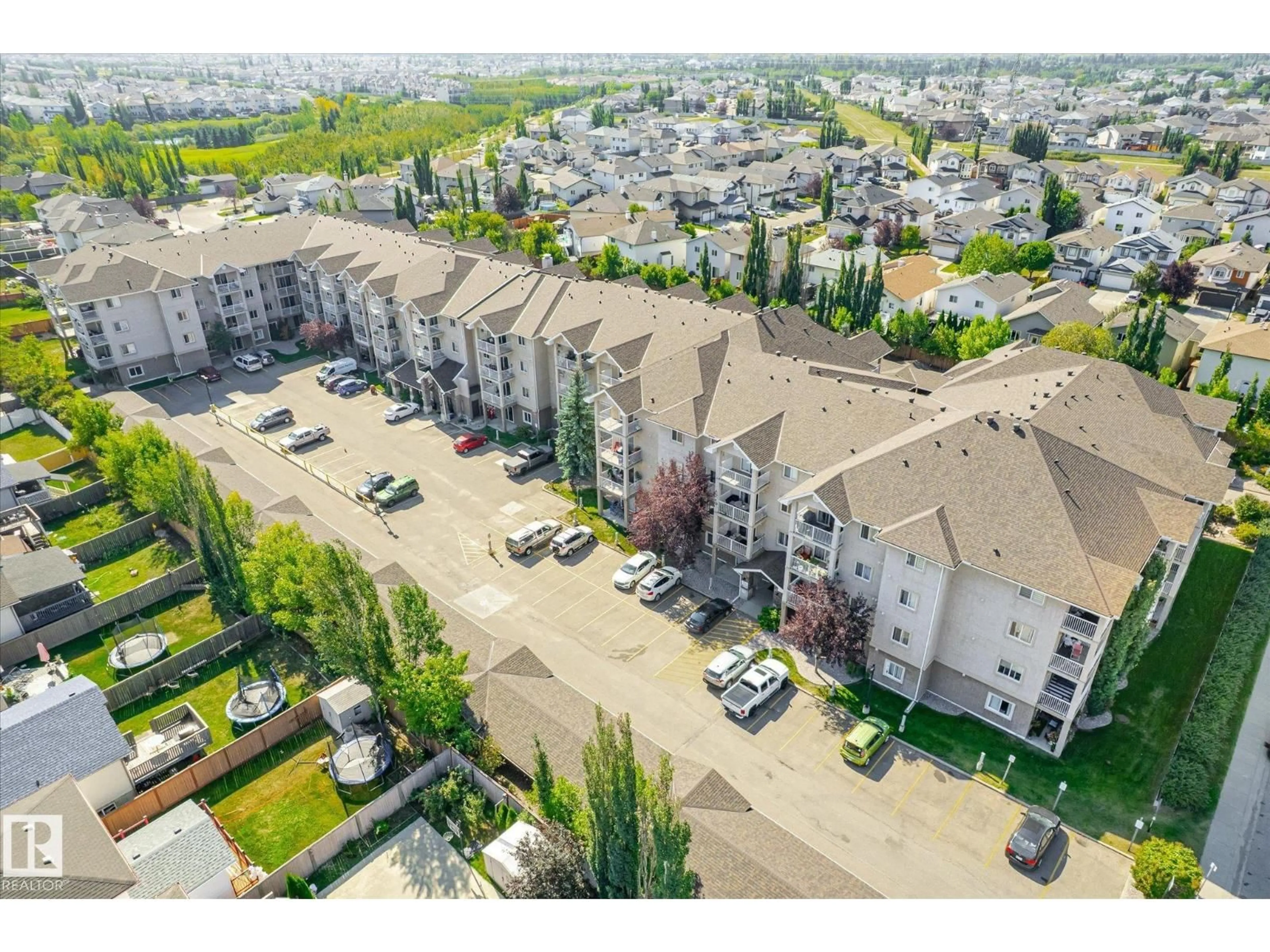 A pic from outside/outdoor area/front of a property/back of a property/a pic from drone, unknown for 305 - 2305 35A AV NW, Edmonton Alberta T6T1Z2
