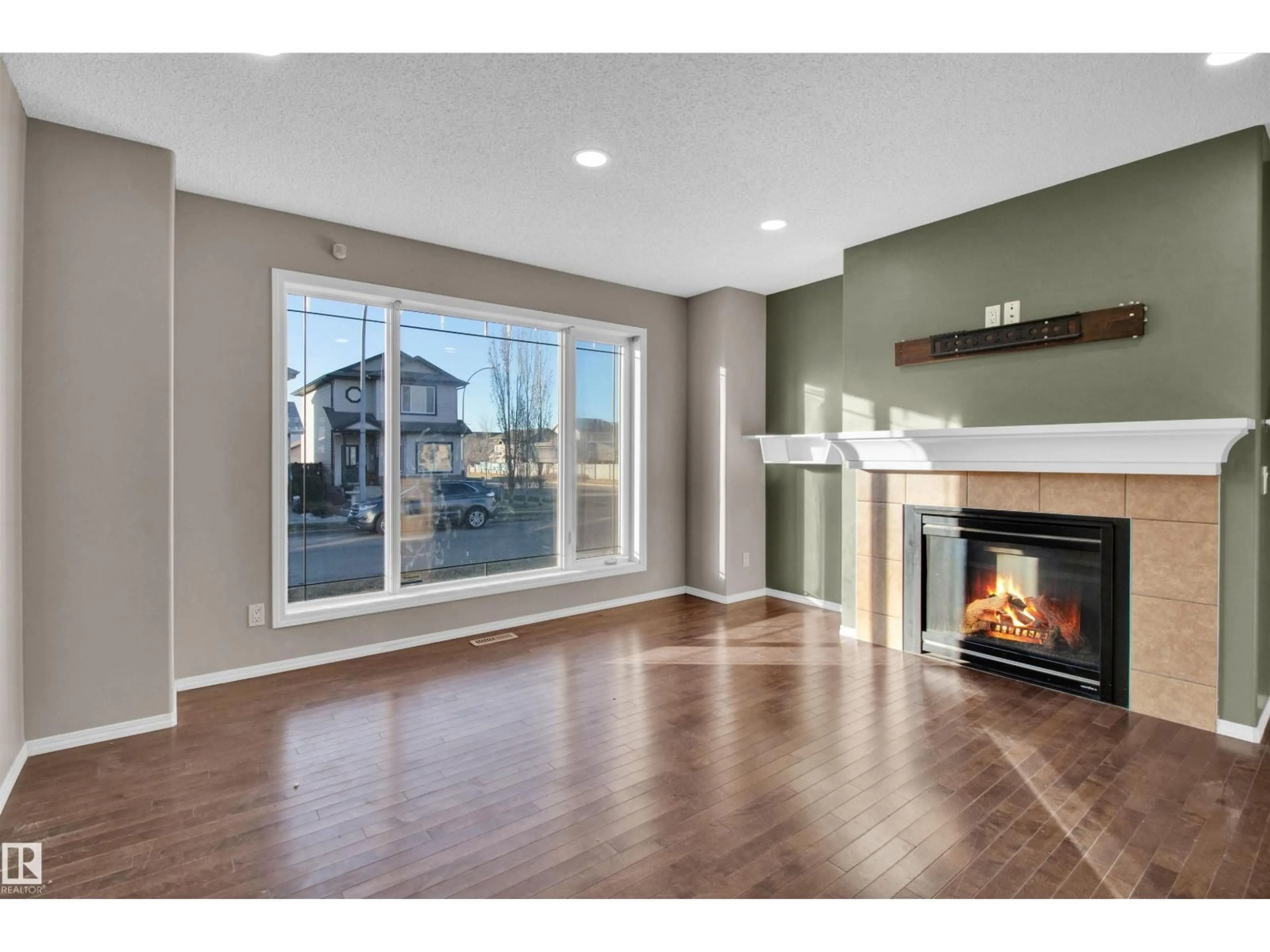 Living room with furniture, wood/laminate floor for 17951 85 ST, Edmonton Alberta T5Z0E4