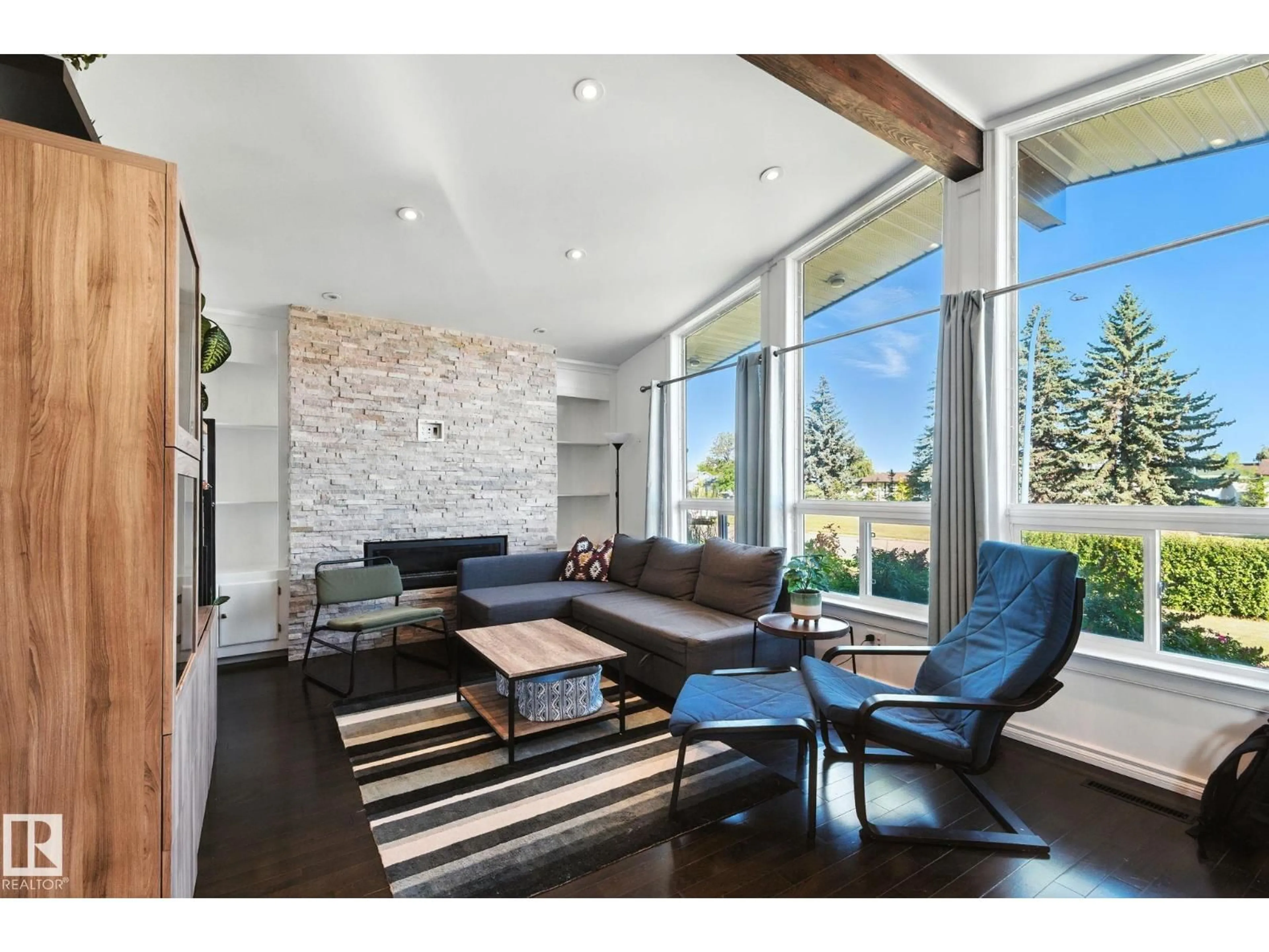 Living room with furniture, unknown for 7923 131A AV, Edmonton Alberta T5C2A2