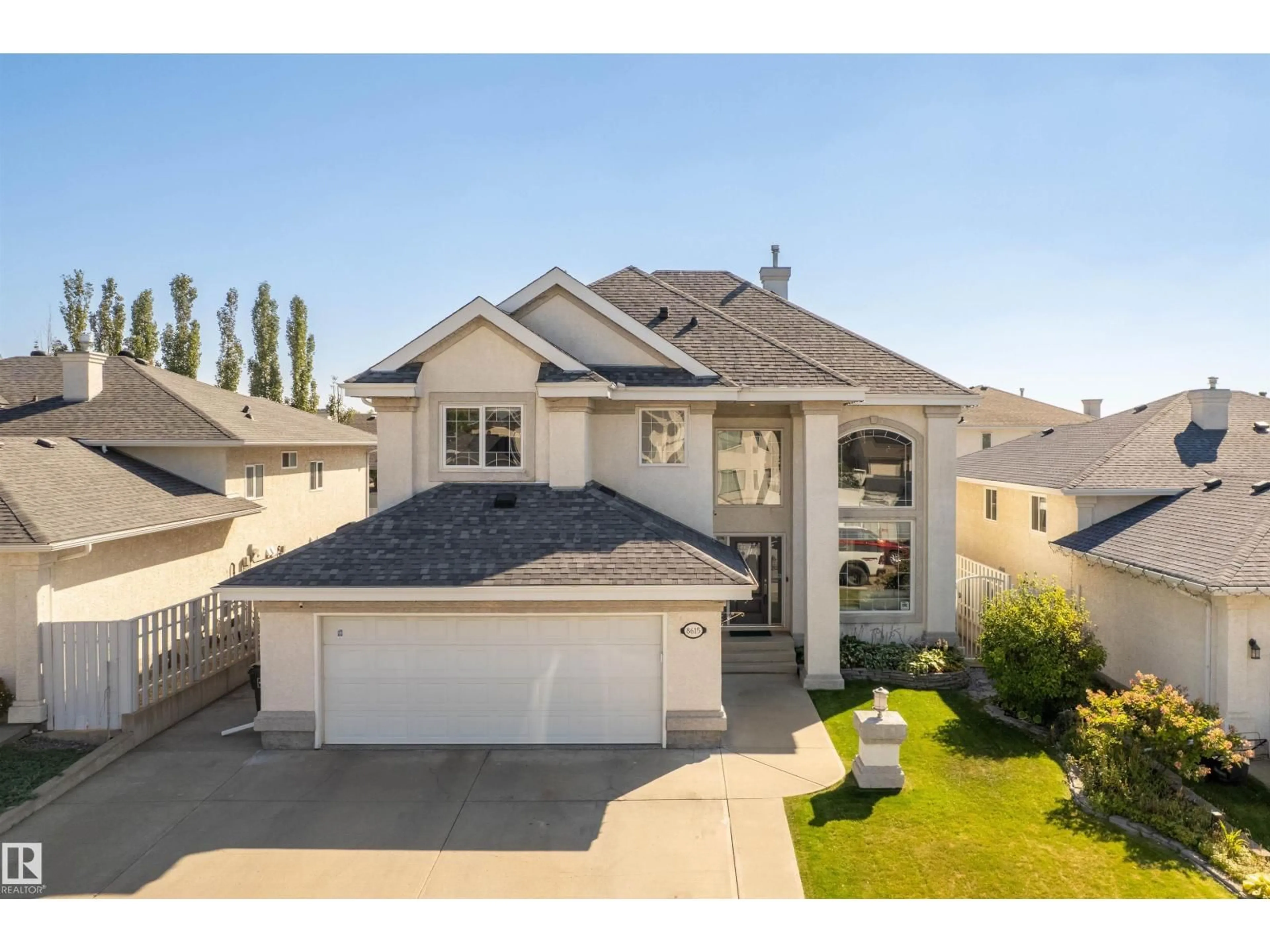 A pic from outside/outdoor area/front of a property/back of a property/a pic from drone, street for 8615 159A AV, Edmonton Alberta T5Z3E8