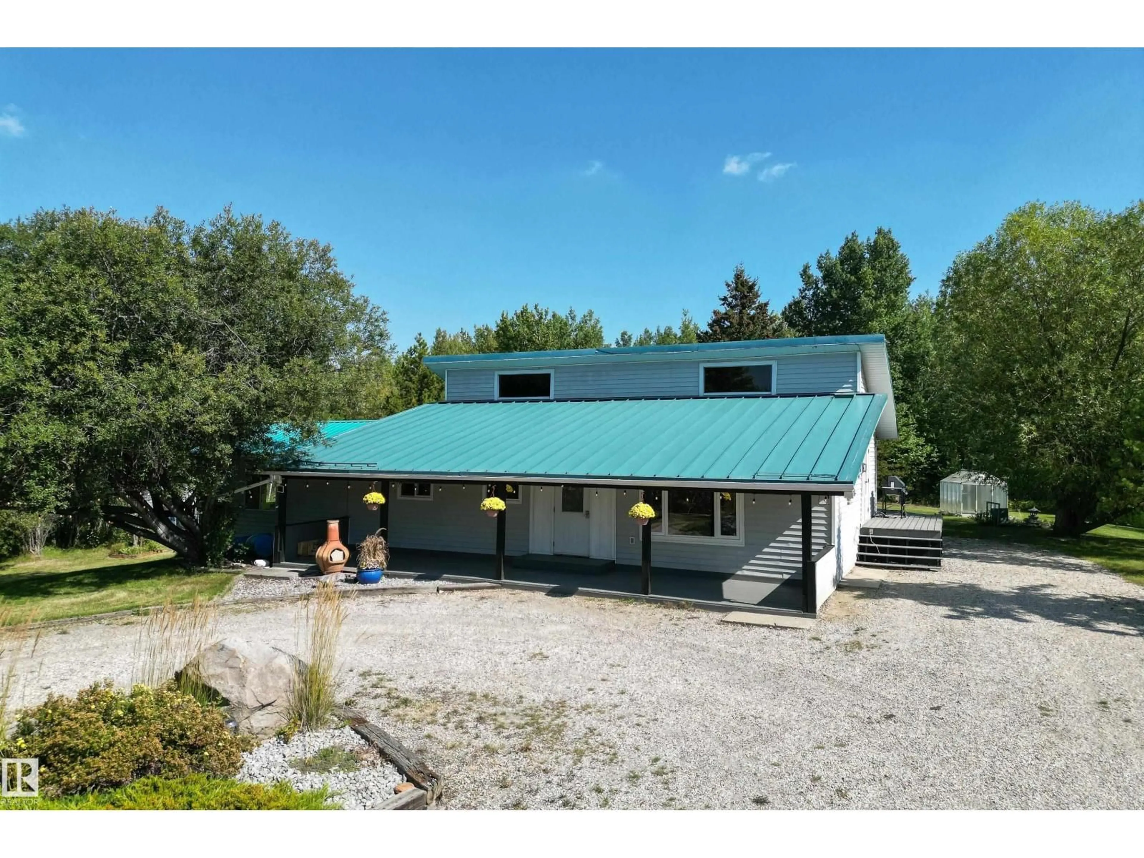 A pic from outside/outdoor area/front of a property/back of a property/a pic from drone, building for #43 - 54222 RGE ROAD 25, Rural Lac Ste. Anne County Alberta T0E0A1