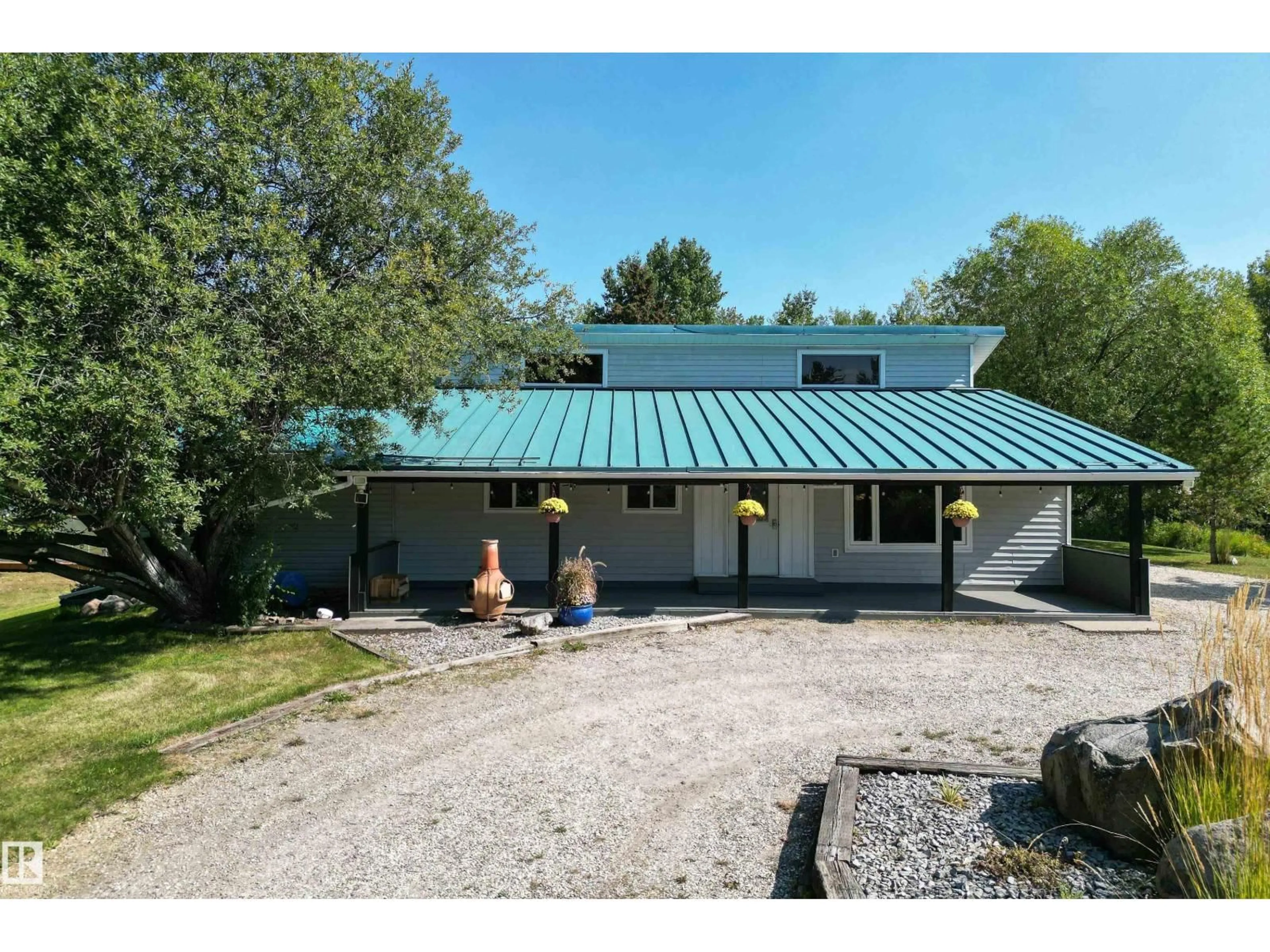A pic from outside/outdoor area/front of a property/back of a property/a pic from drone, unknown for #43 - 54222 RGE ROAD 25, Rural Lac Ste. Anne County Alberta T0E0A1