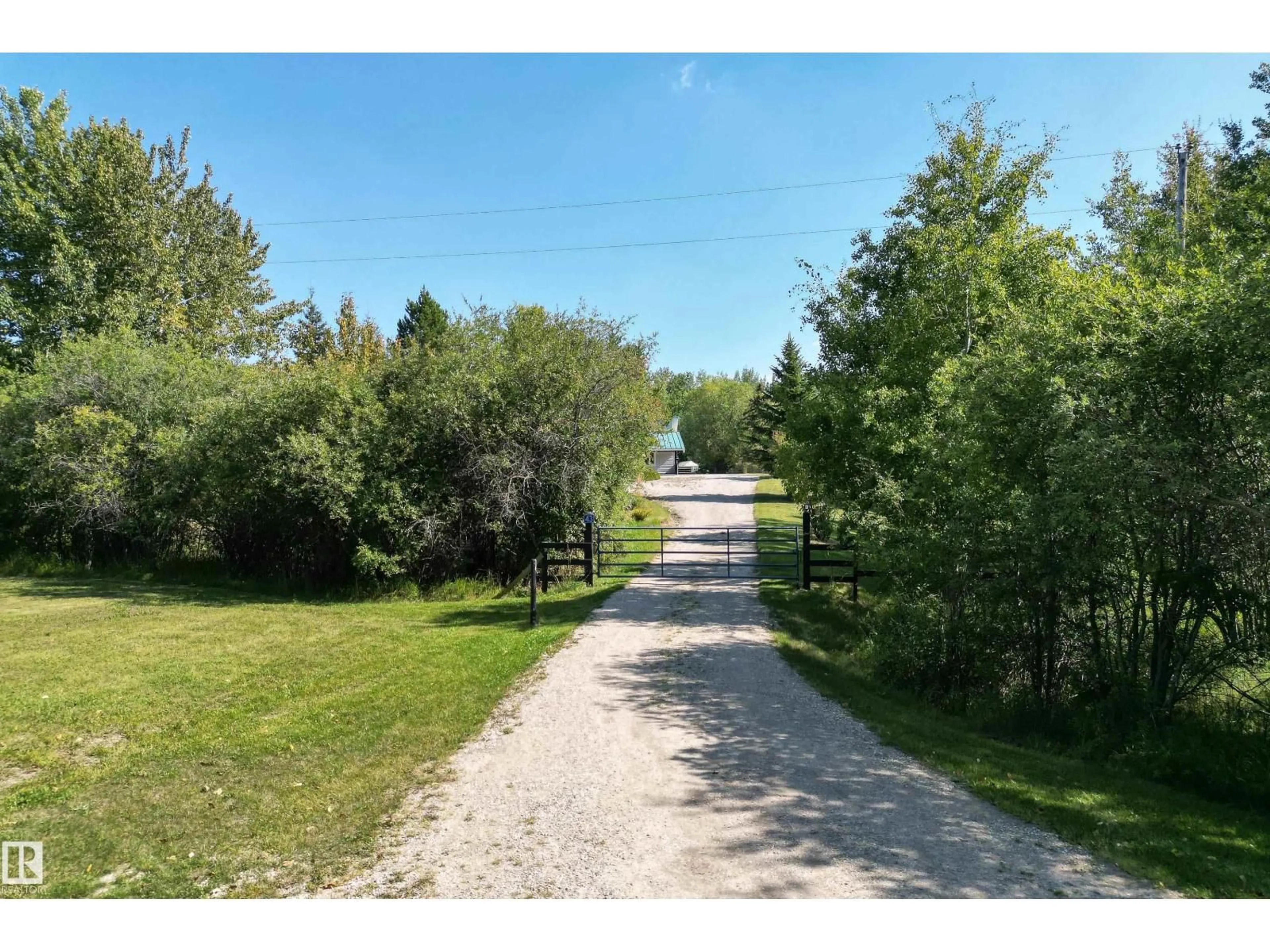 A pic from outside/outdoor area/front of a property/back of a property/a pic from drone, unknown for #43 - 54222 RGE ROAD 25, Rural Lac Ste. Anne County Alberta T0E0A1