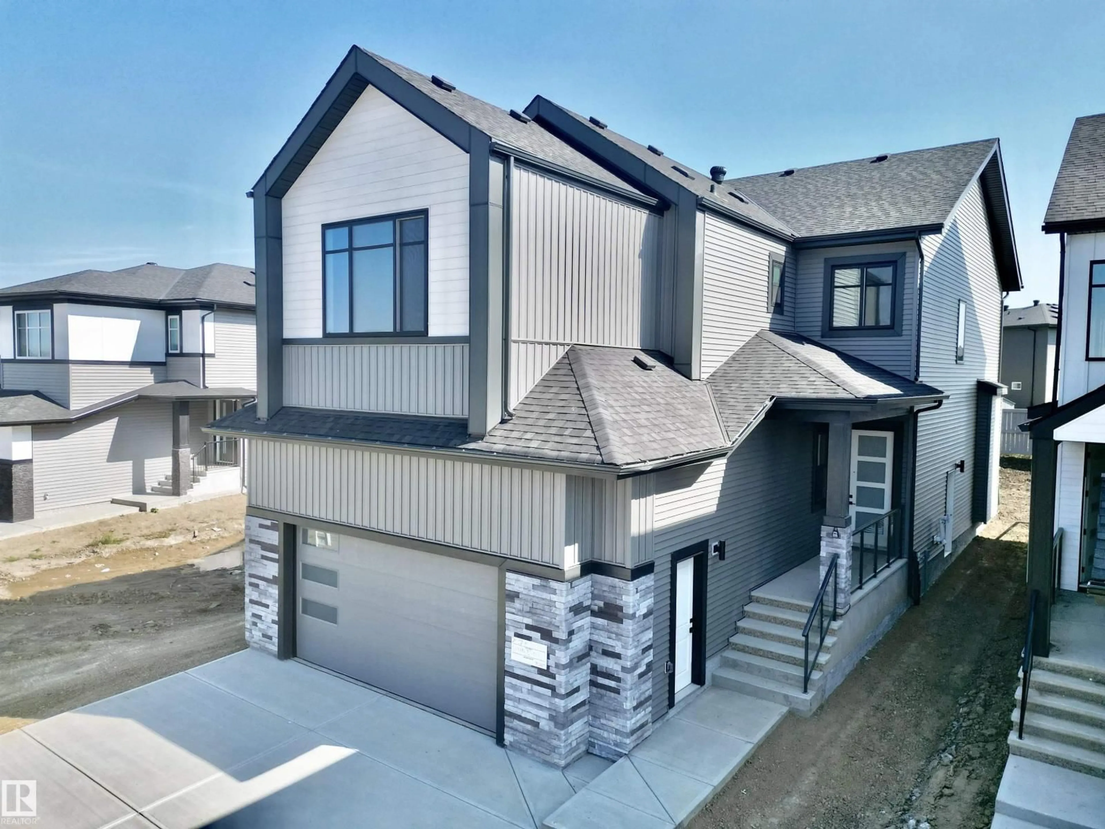 A pic from outside/outdoor area/front of a property/back of a property/a pic from drone, street for SW - 7027 KIVIAQ CR, Edmonton Alberta T6W5R2