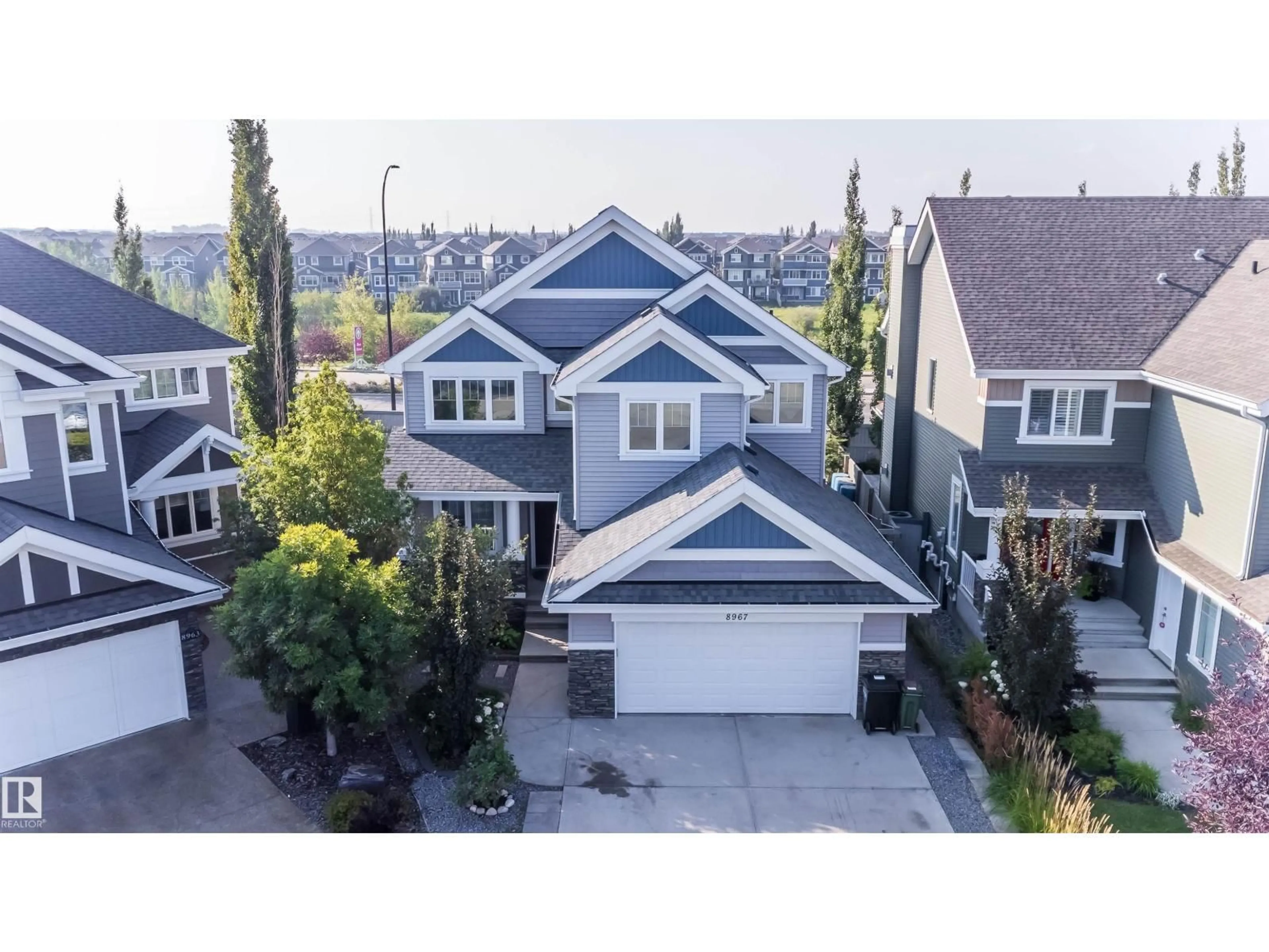 A pic from outside/outdoor area/front of a property/back of a property/a pic from drone, street for SW - 8967 24 AV, Edmonton Alberta T6X1A6