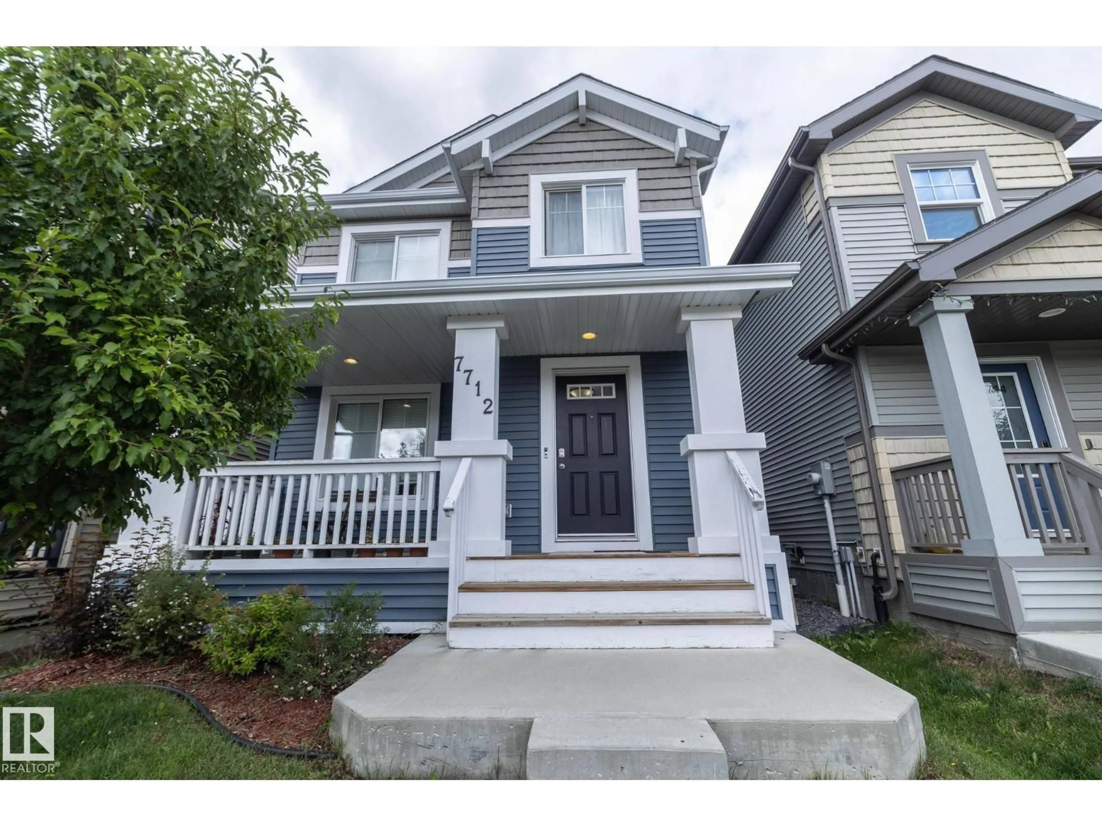 Home with vinyl exterior material, street for NW - 7712 EIFERT CR, Edmonton Alberta T6M0W2