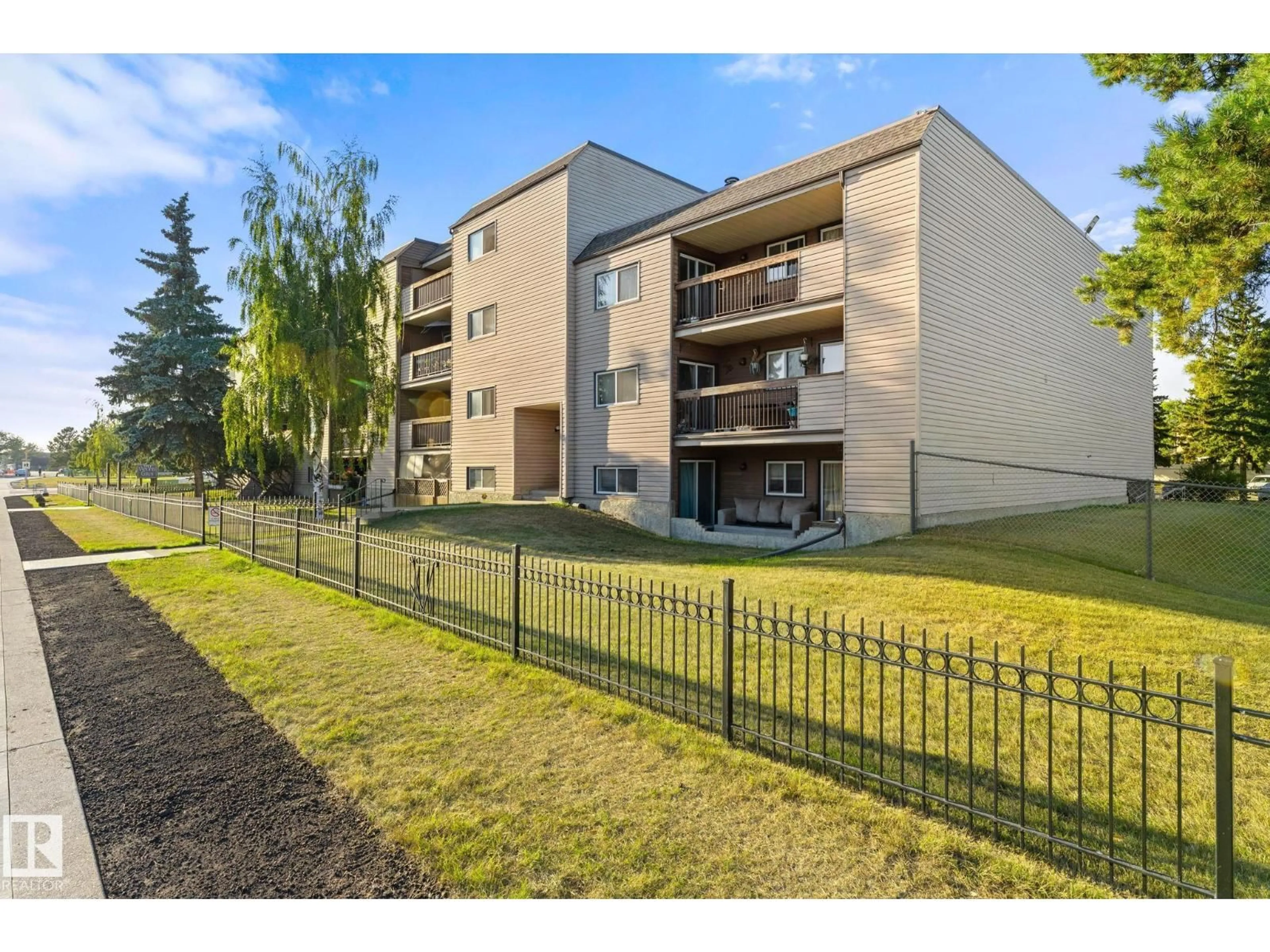A pic from outside/outdoor area/front of a property/back of a property/a pic from drone, unknown for 202 - 2904 139 AV, Edmonton Alberta T5Y1P7