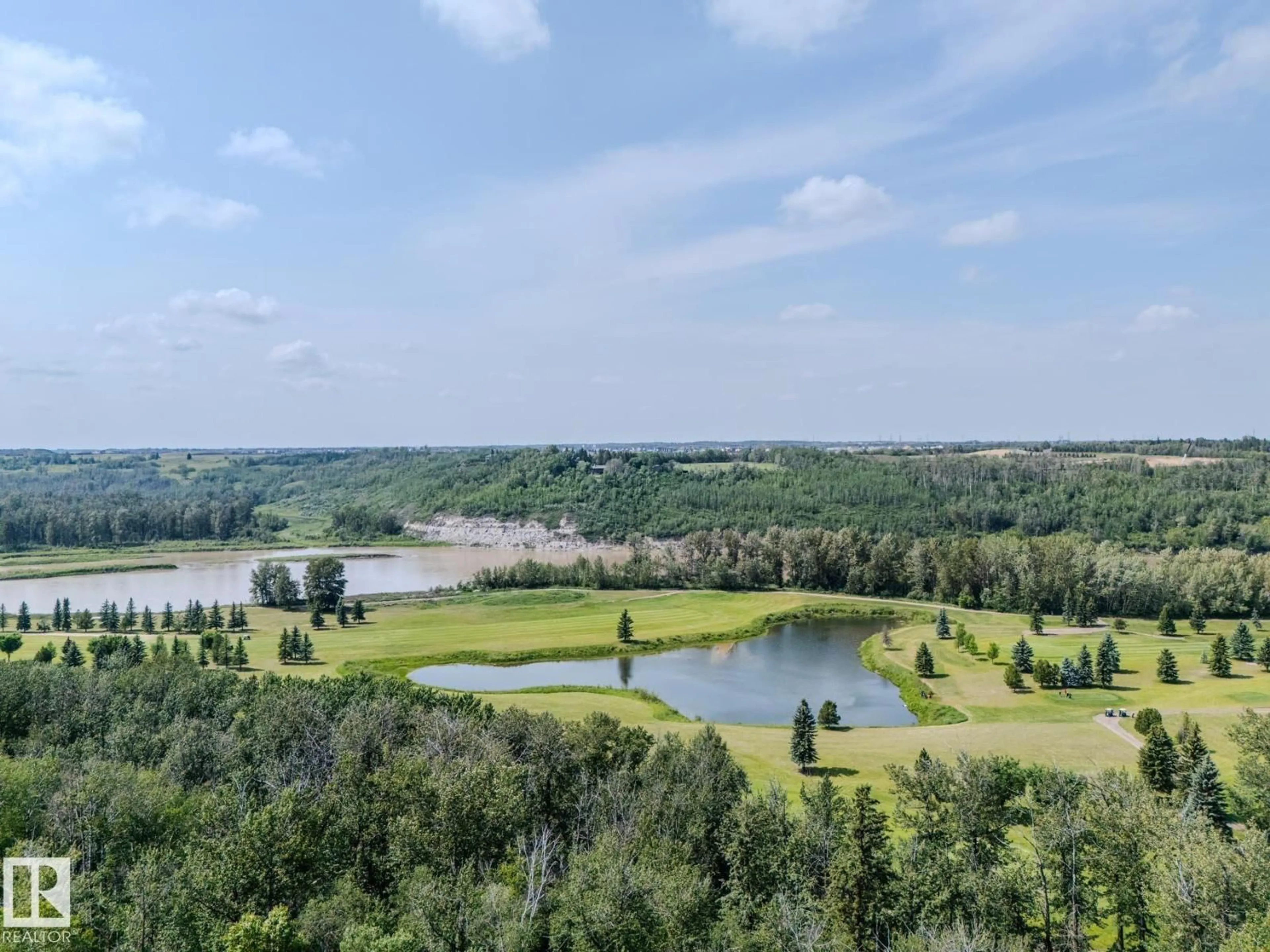 A pic from outside/outdoor area/front of a property/back of a property/a pic from drone, water/lake/river/ocean view for 140 WINDERMERE DR, Edmonton Alberta T6W0S4