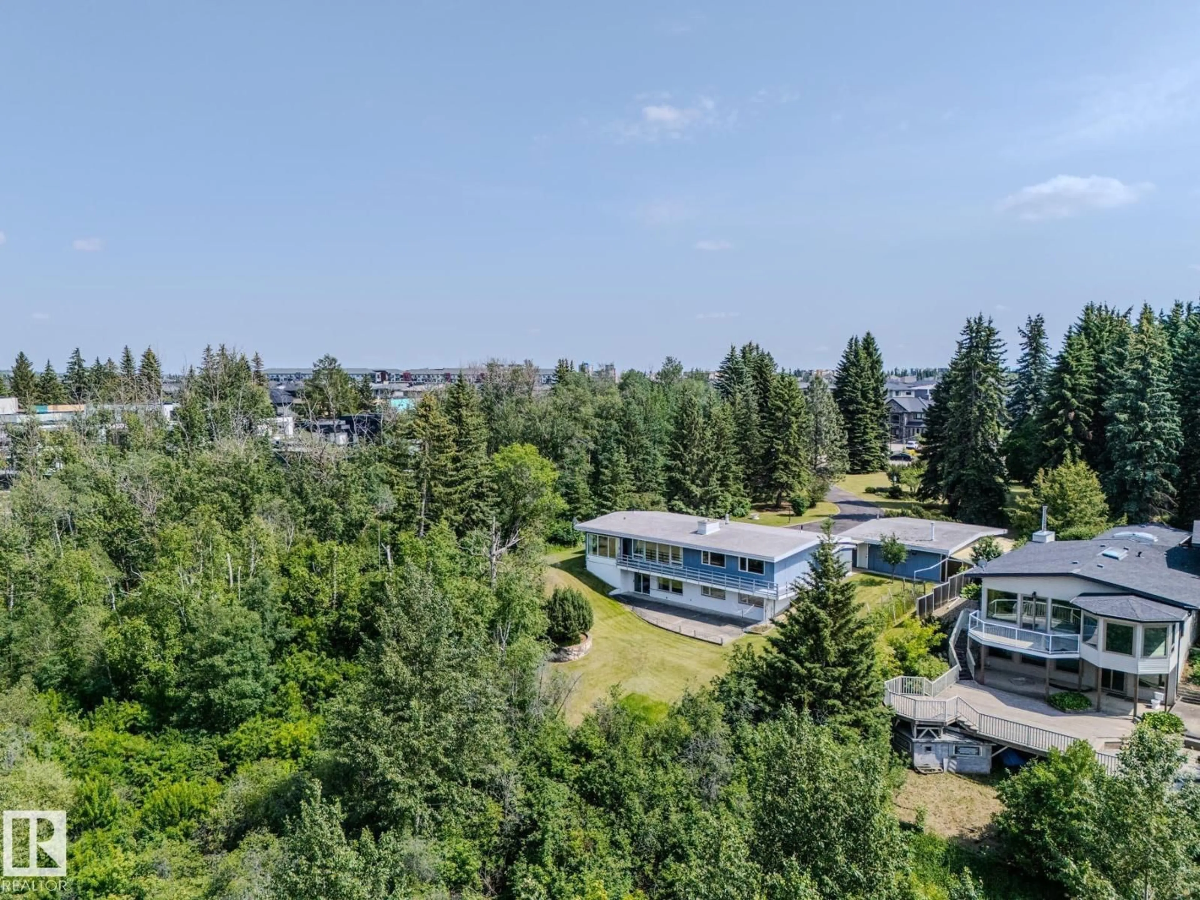 A pic from outside/outdoor area/front of a property/back of a property/a pic from drone, unknown for 140 WINDERMERE DR, Edmonton Alberta T6W0S4