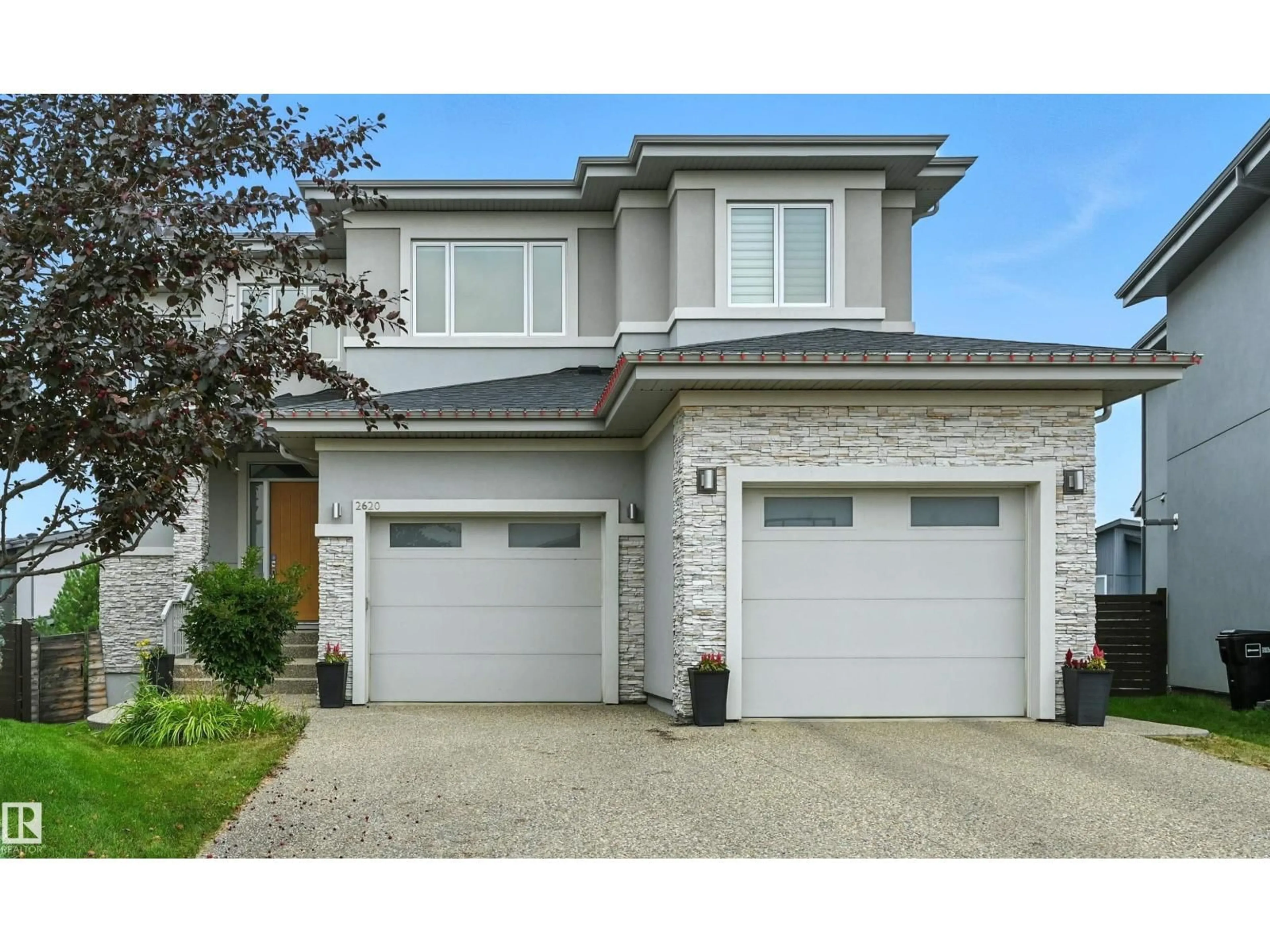 Home with vinyl exterior material, street for 2620 WHEATON CL NW, Edmonton Alberta T6W2X5