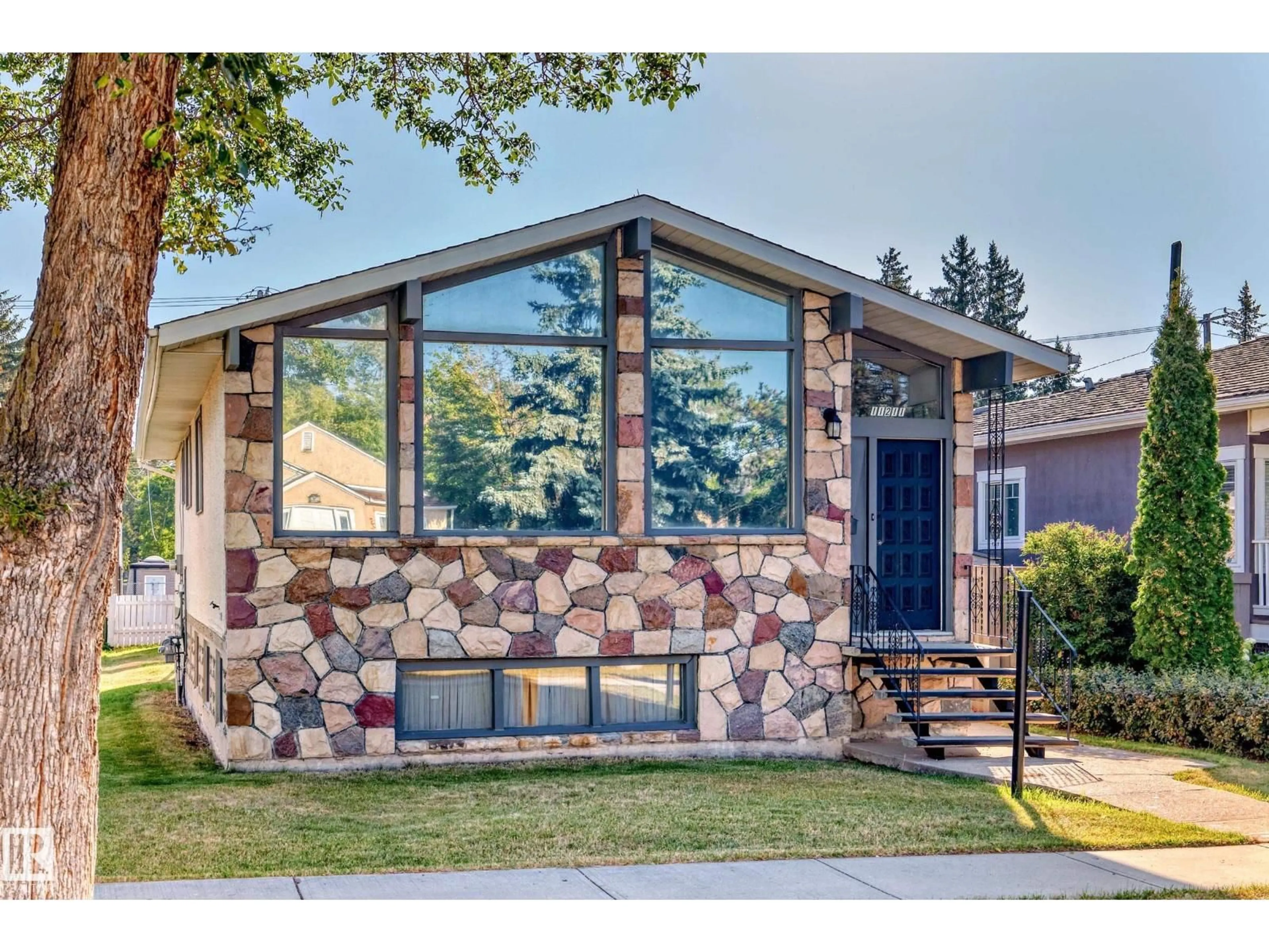 Home with brick exterior material, mountain view for NW - 11211 79 ST, Edmonton Alberta T5B2J8