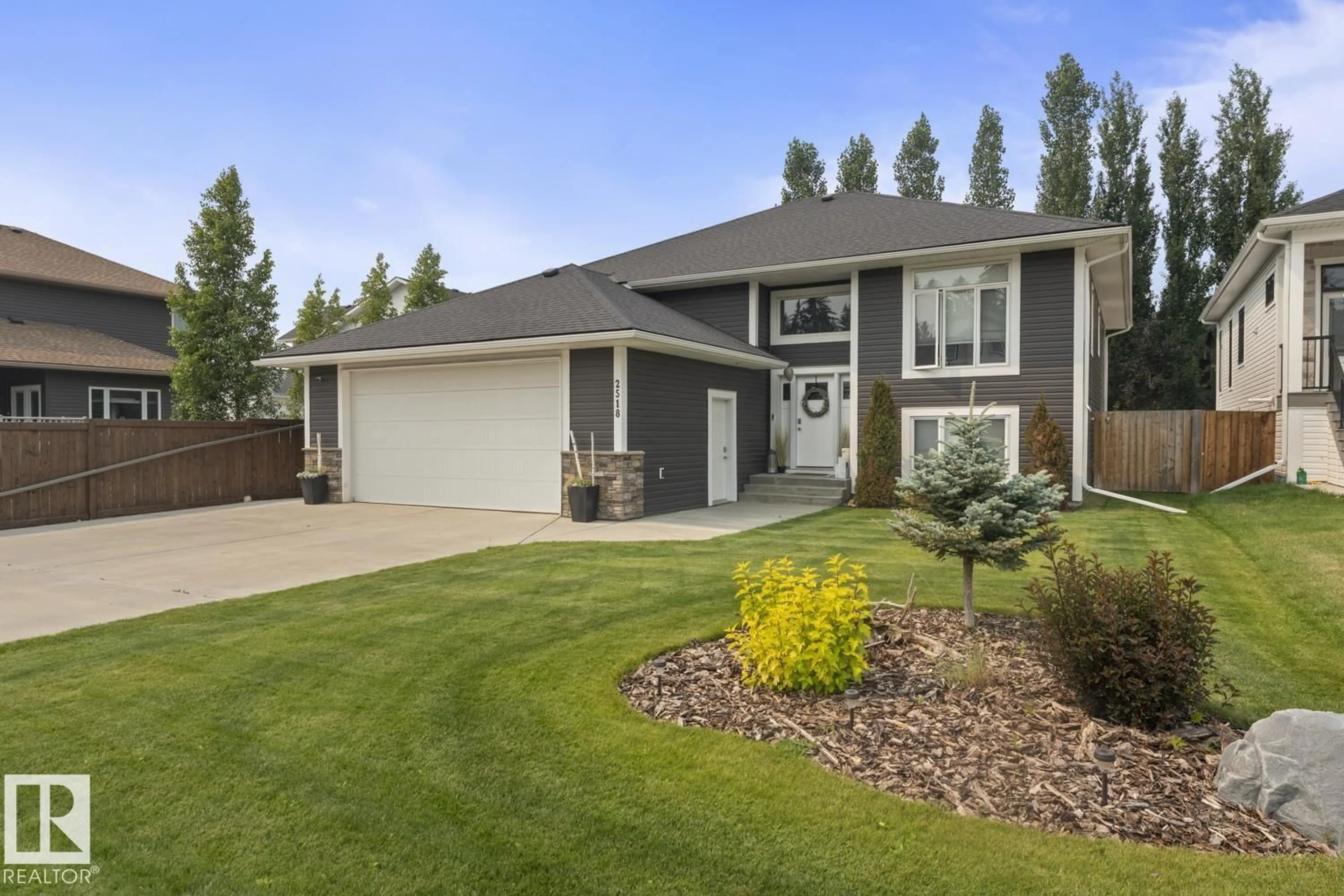 Home with vinyl exterior material, street for 2518 LOCKHART WY, Cold Lake Alberta T9M0B3