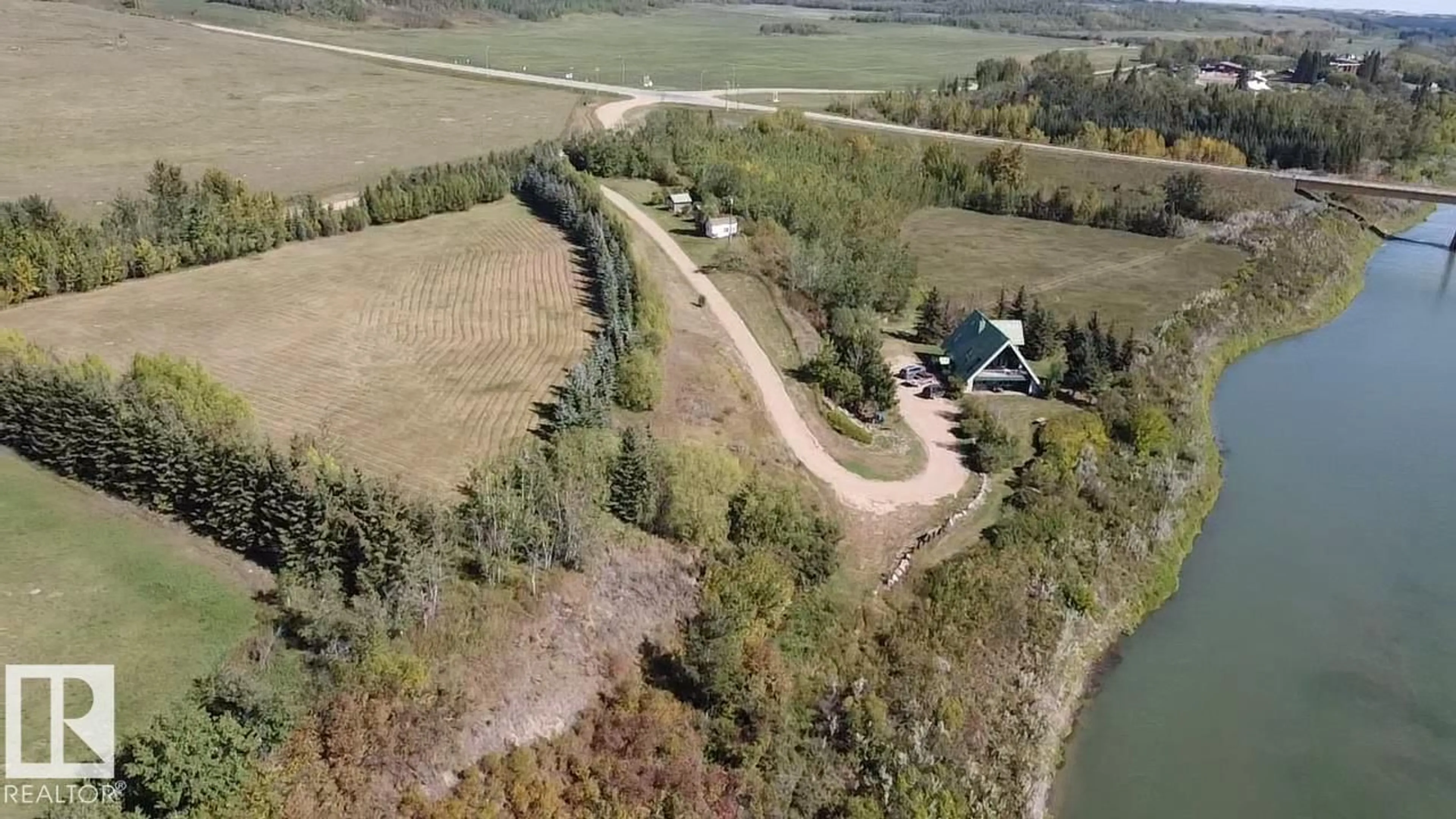 A pic from outside/outdoor area/front of a property/back of a property/a pic from drone, water/lake/river/ocean view for 17401 VICTORIA TR, Rural Smoky Lake County Alberta T0A3C0