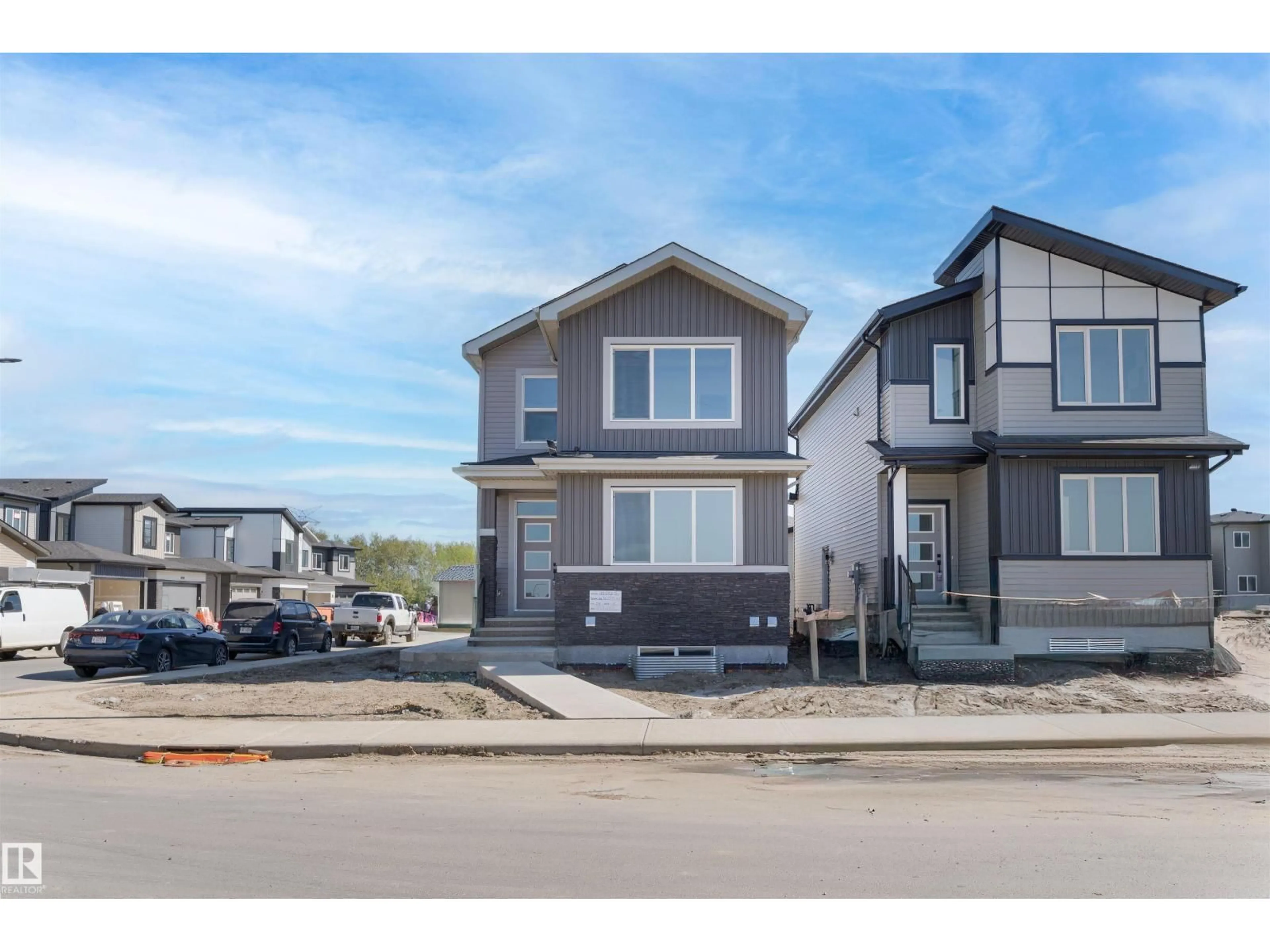 Home with vinyl exterior material, street for SW - 111 25 ST, Edmonton Alberta T6X3K3