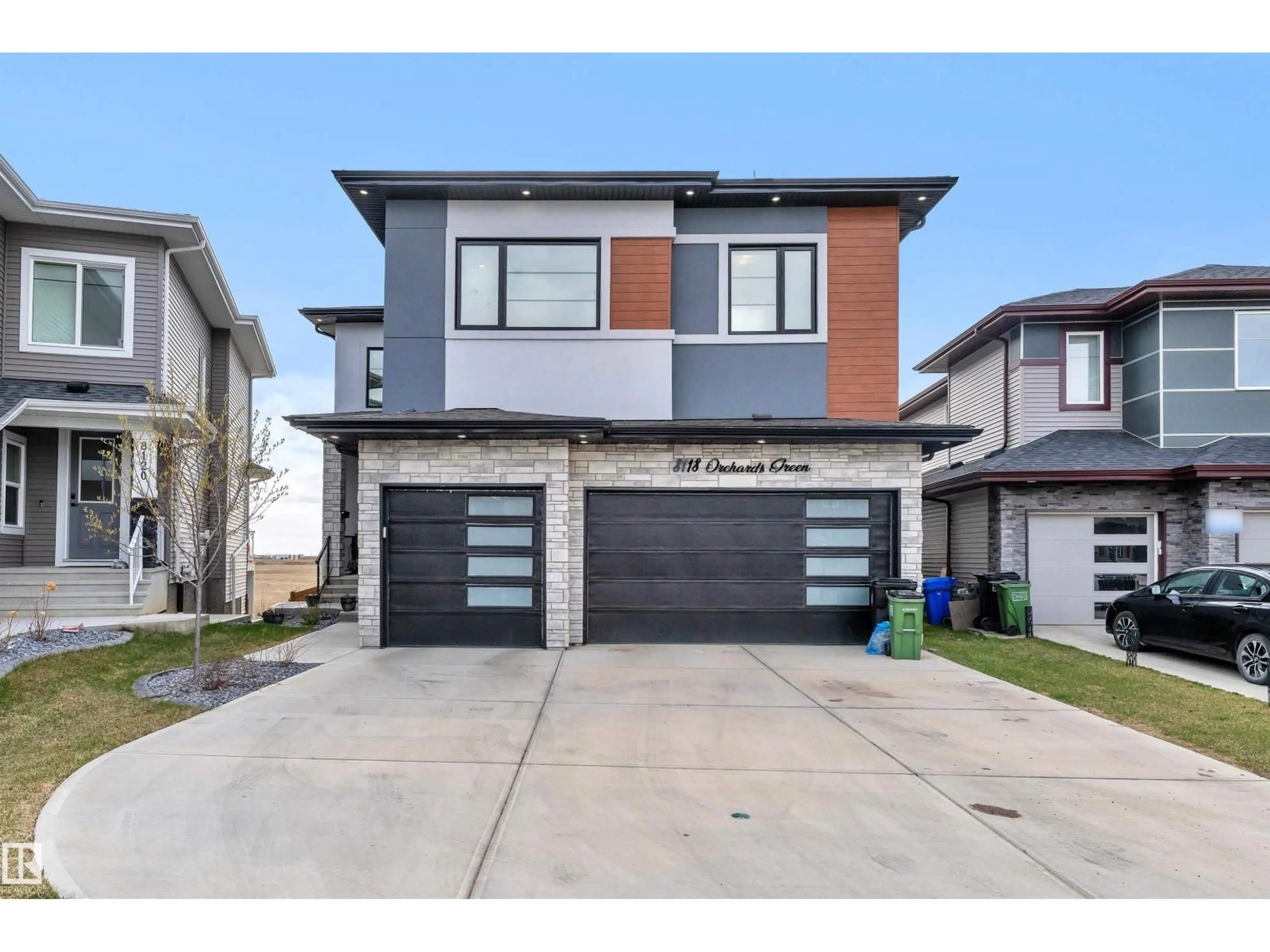 Home with brick exterior material, street for SW - 8118 ORCHARDS GREEN GR, Edmonton Alberta T6X2N5