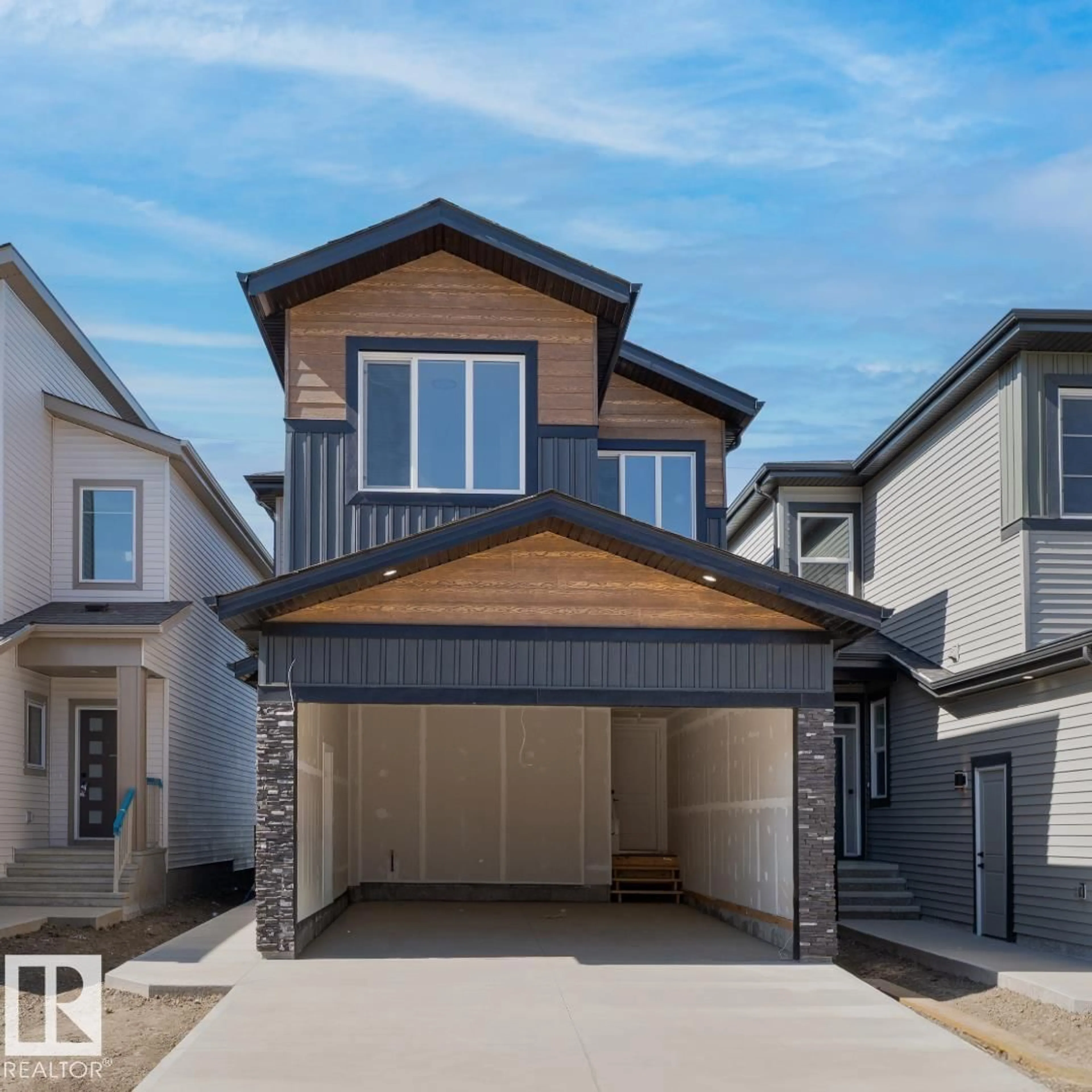 Home with vinyl exterior material, street for SW - 220 25 ST, Edmonton Alberta T6X3K3