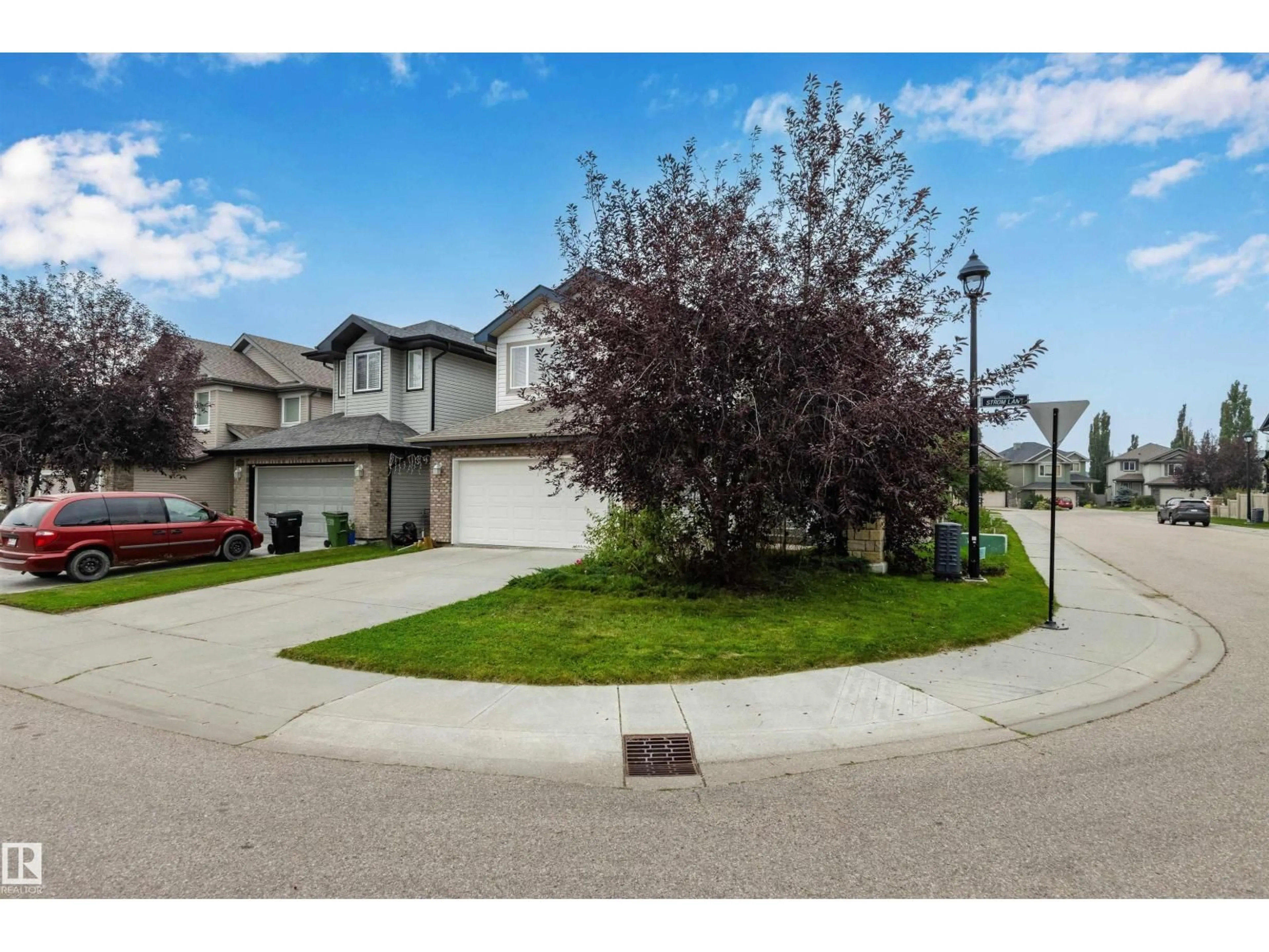 A pic from outside/outdoor area/front of a property/back of a property/a pic from drone, street for 6914 STROM LN, Edmonton Alberta T6R0G3