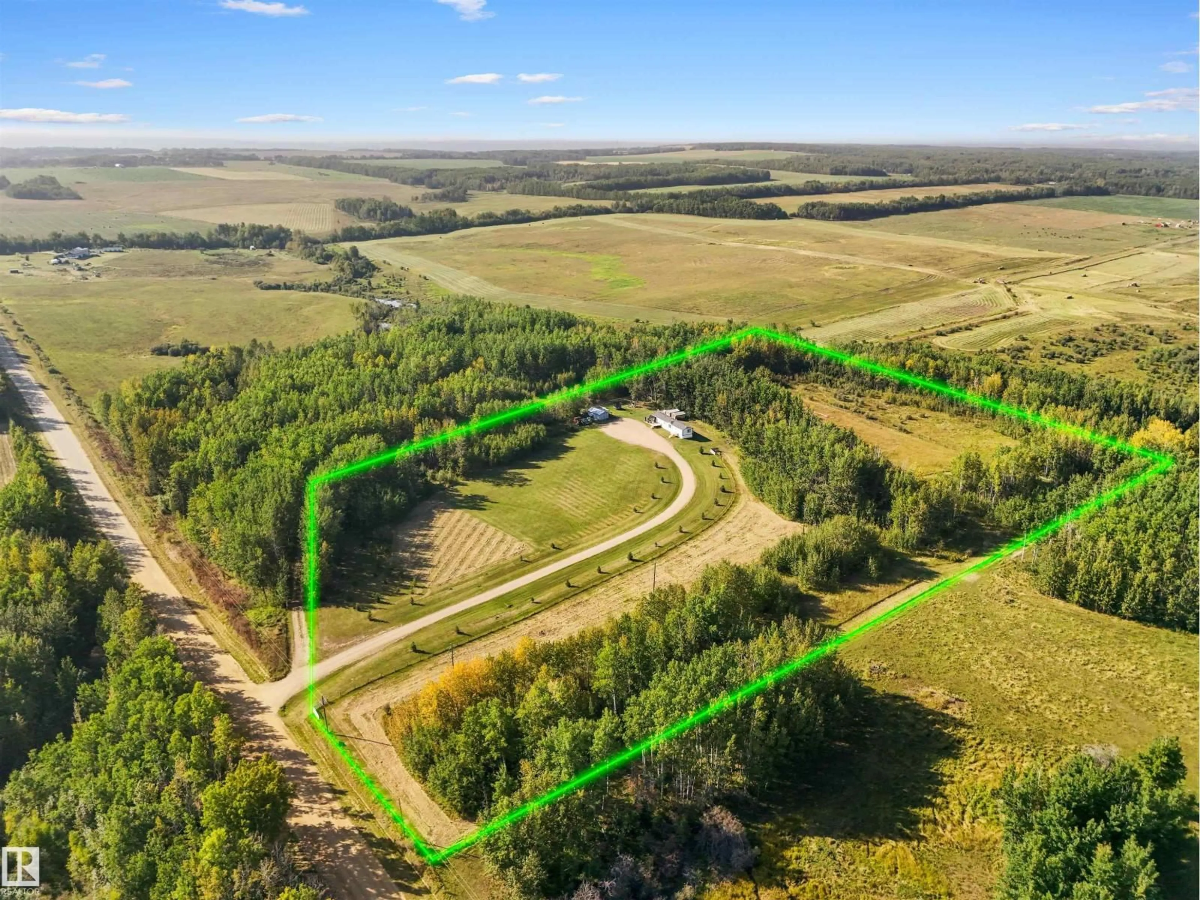 A pic from outside/outdoor area/front of a property/back of a property/a pic from drone, forest/trees view for 7418 TWP ROAD 510, Rural Parkland County Alberta T0C1Z0