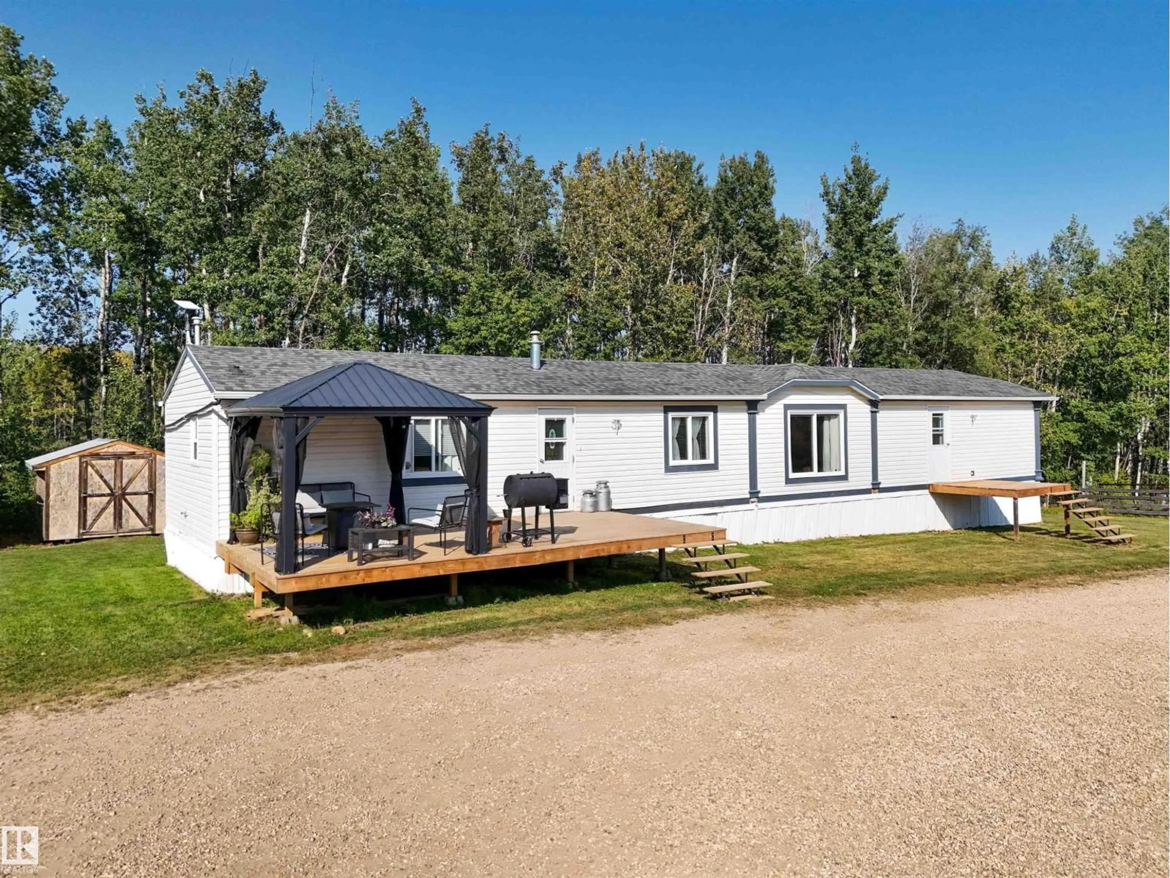 A pic from outside/outdoor area/front of a property/back of a property/a pic from drone, unknown for 7418 TWP ROAD 510, Rural Parkland County Alberta T0C1Z0