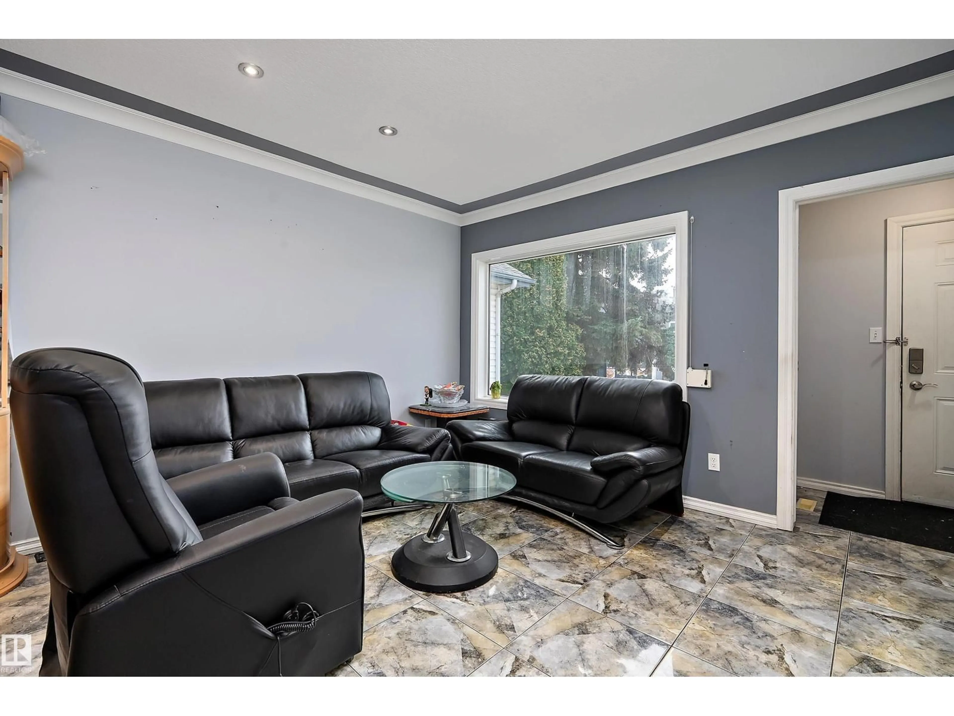 Living room with furniture, unknown for NW - 10913 97 ST, Edmonton Alberta T5H2M7