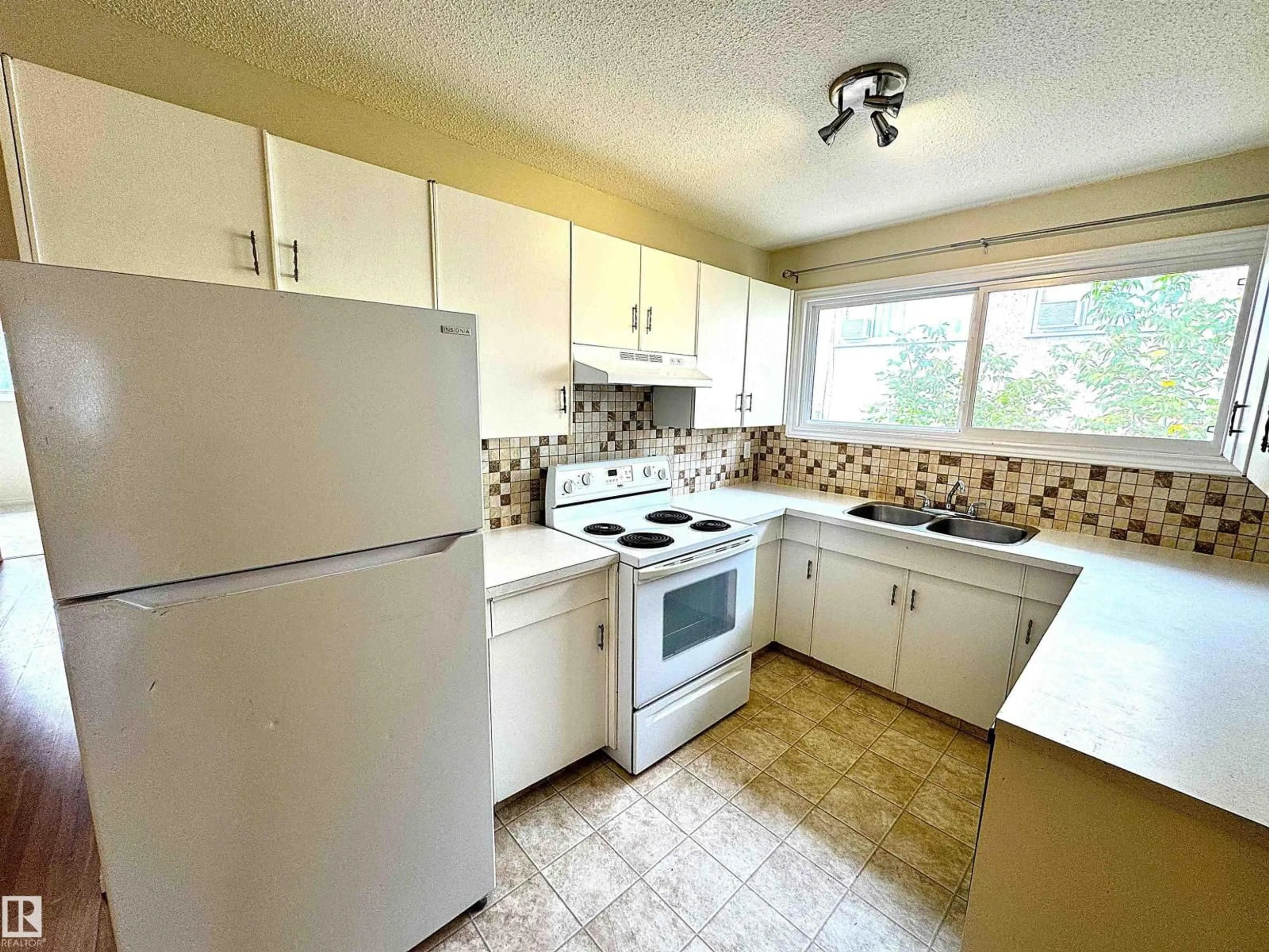 Standard kitchen, unknown for 3315 & 3317 105 AV, Edmonton Alberta T5W0B5