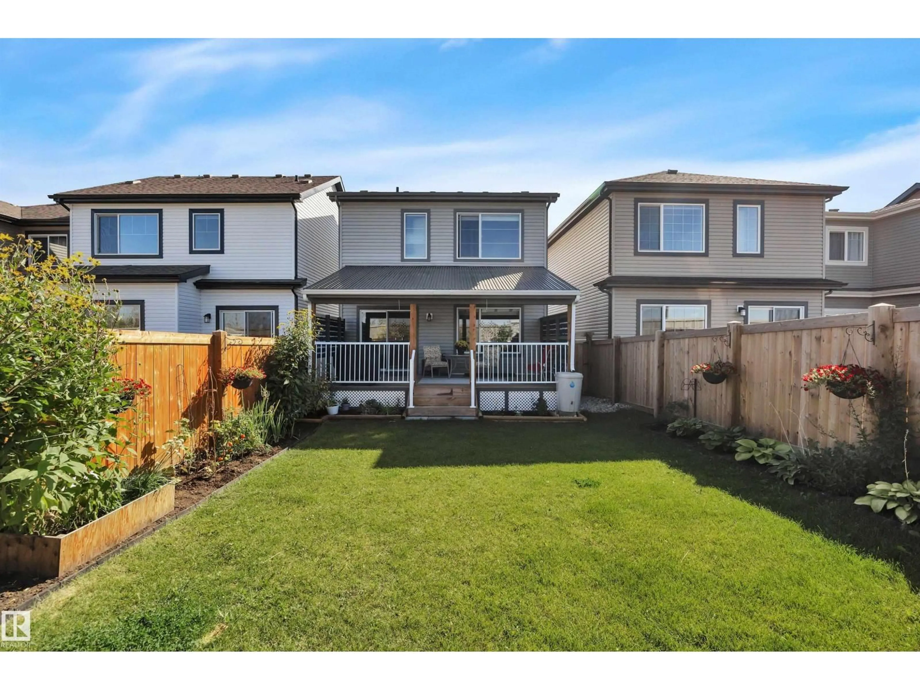 A pic from outside/outdoor area/front of a property/back of a property/a pic from drone, street for 157 LARCH CR, Leduc Alberta T9E0S5