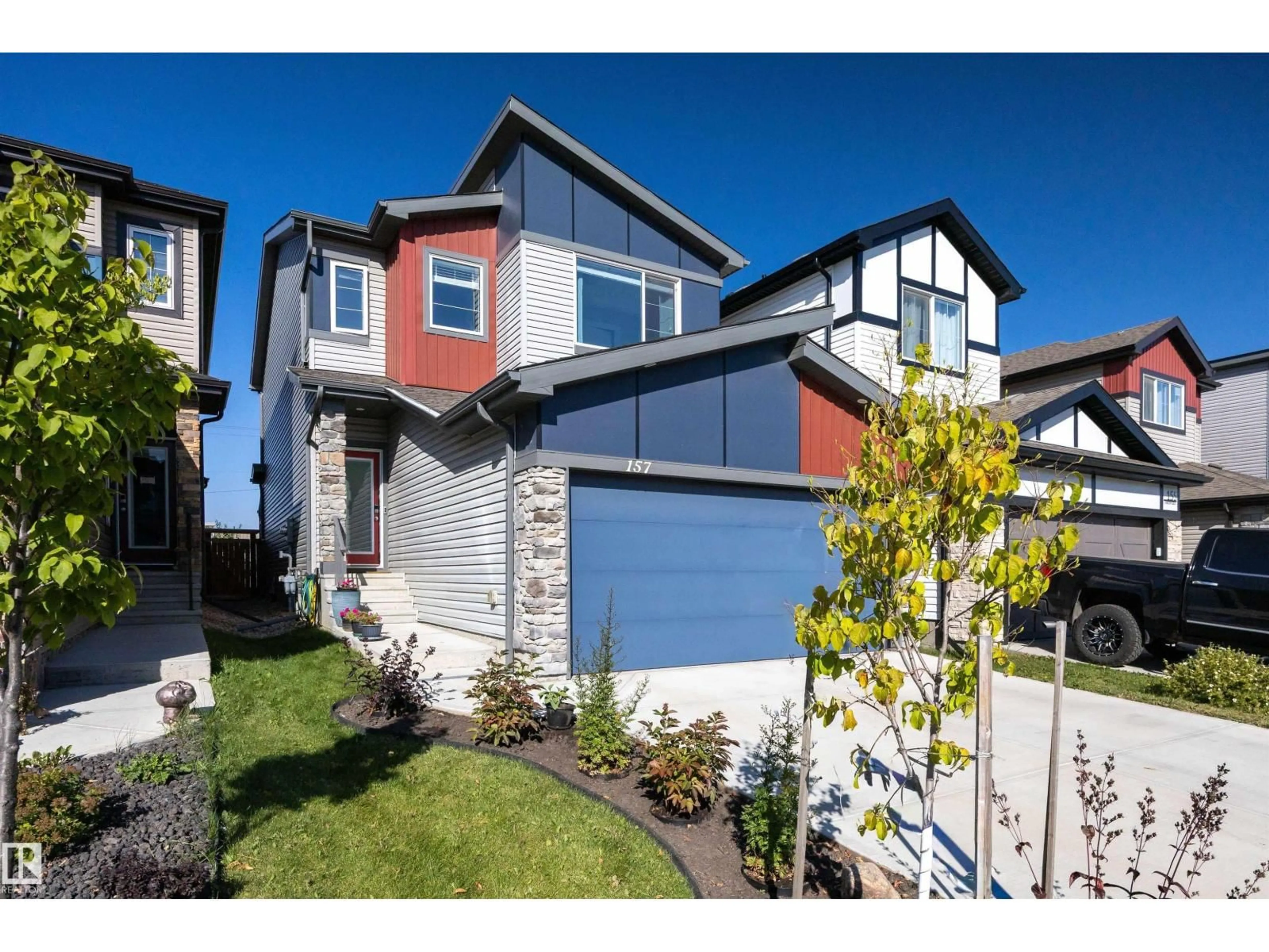 Home with vinyl exterior material, street for 157 LARCH CR, Leduc Alberta T9E0S5