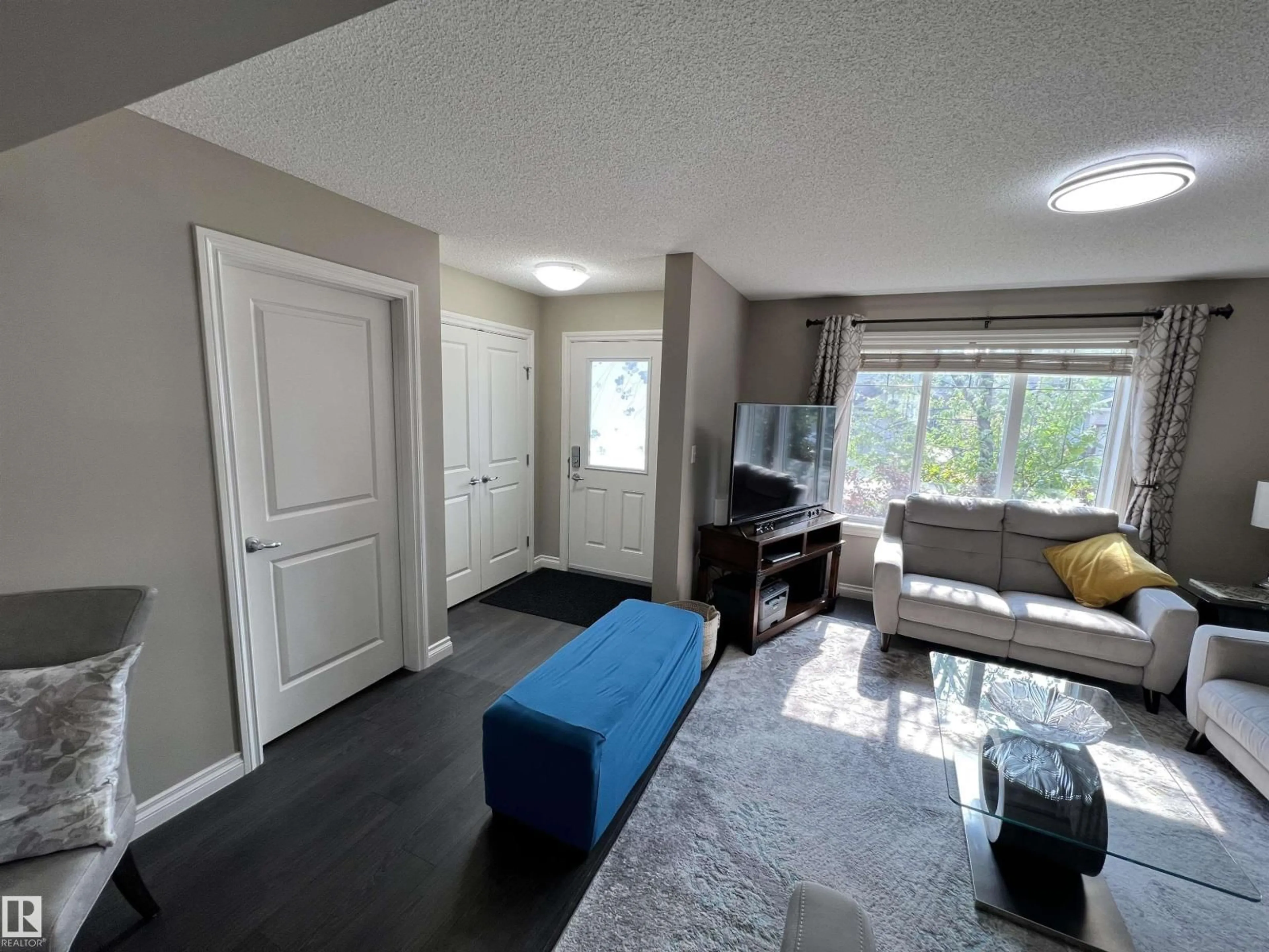 Living room with furniture, unknown for 3020 15 AV, Edmonton Alberta T6T0Z5