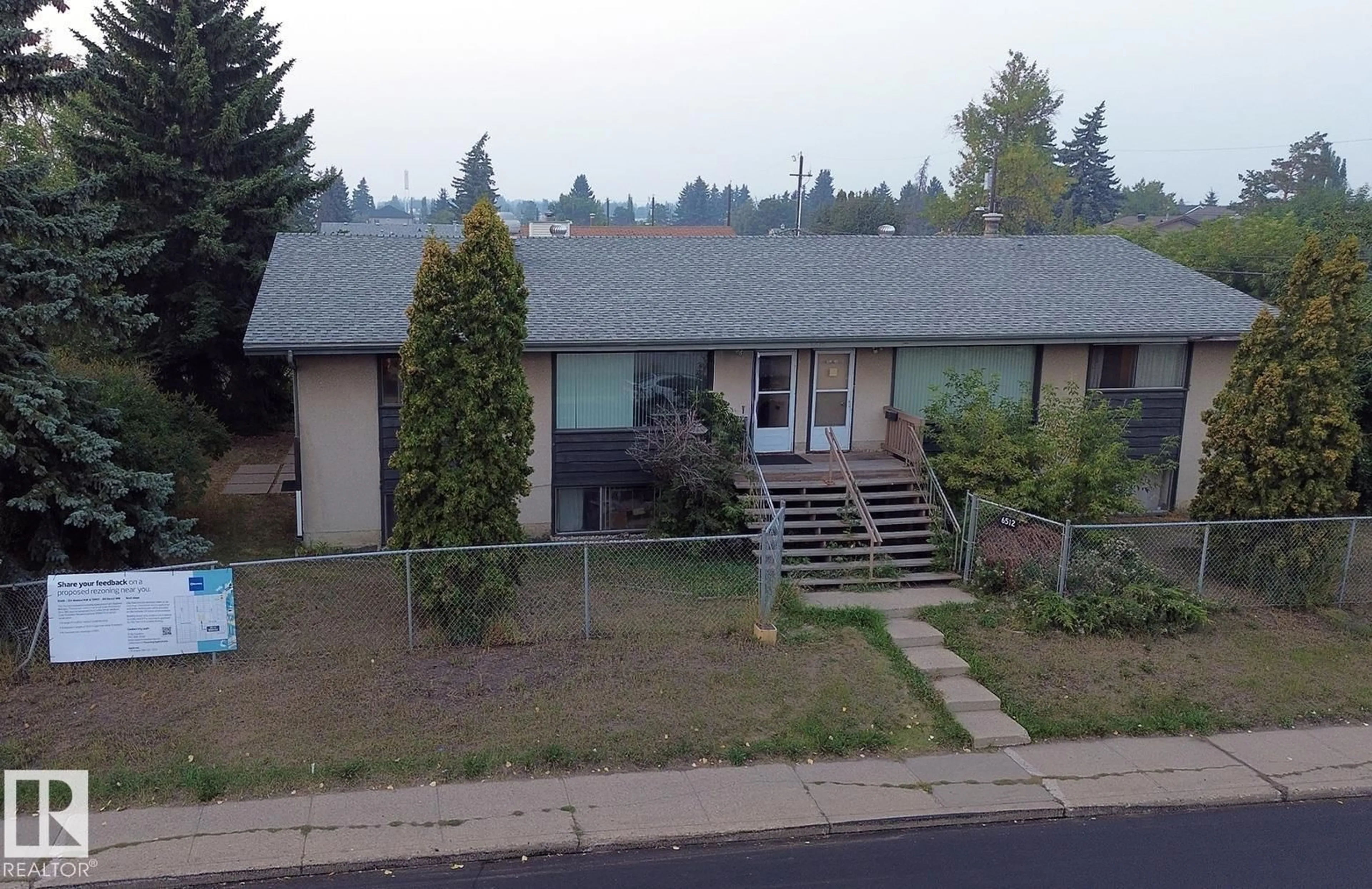 A pic from outside/outdoor area/front of a property/back of a property/a pic from drone, mountain view for 6508 134 AV, Edmonton Alberta T5A0N2