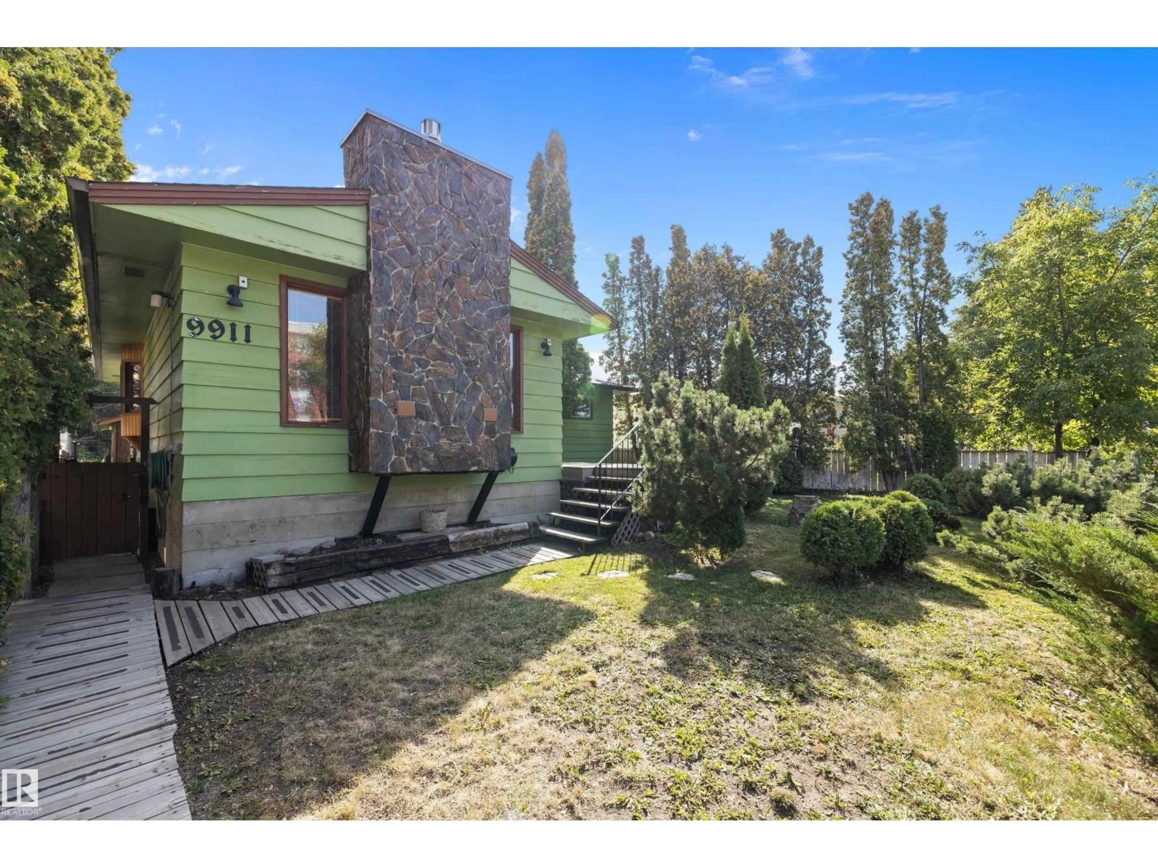 A pic from outside/outdoor area/front of a property/back of a property/a pic from drone, street for 9911 149 ST, Edmonton Alberta T5P1K7