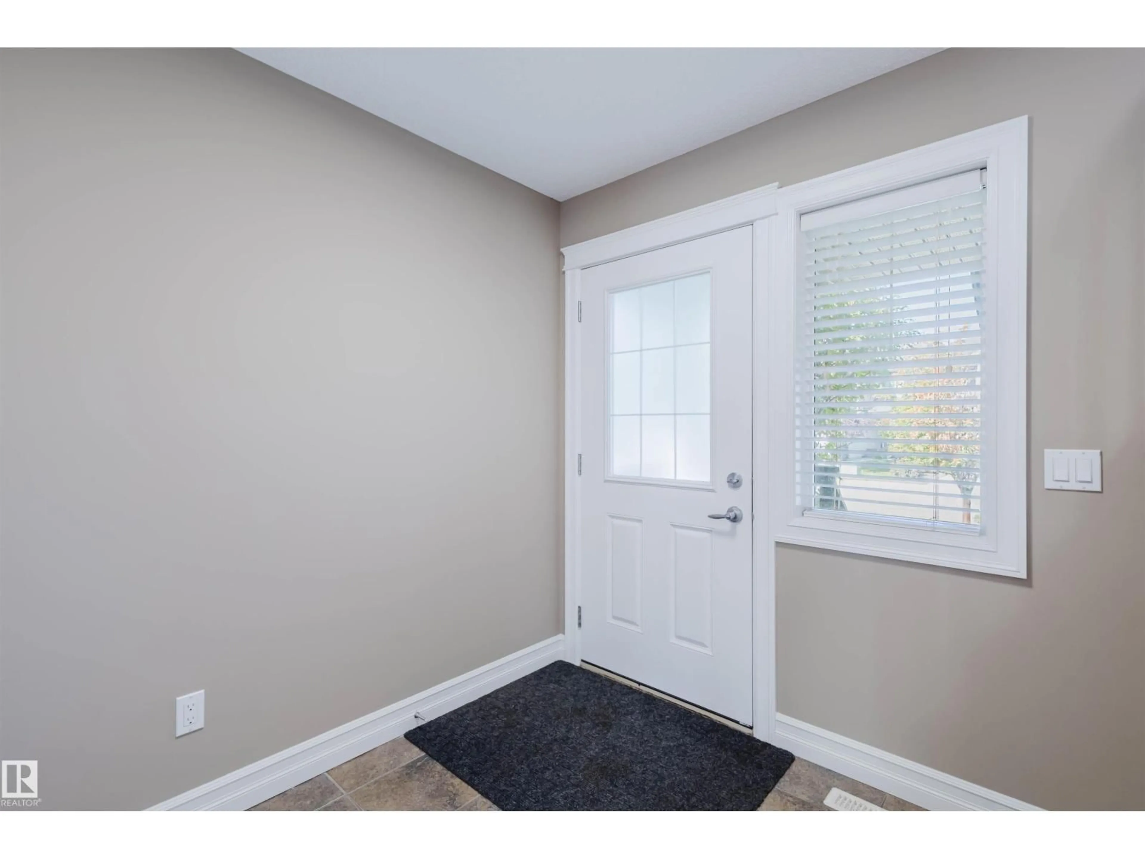 Indoor entryway for 11321 13A AV, Edmonton Alberta T6W0G9