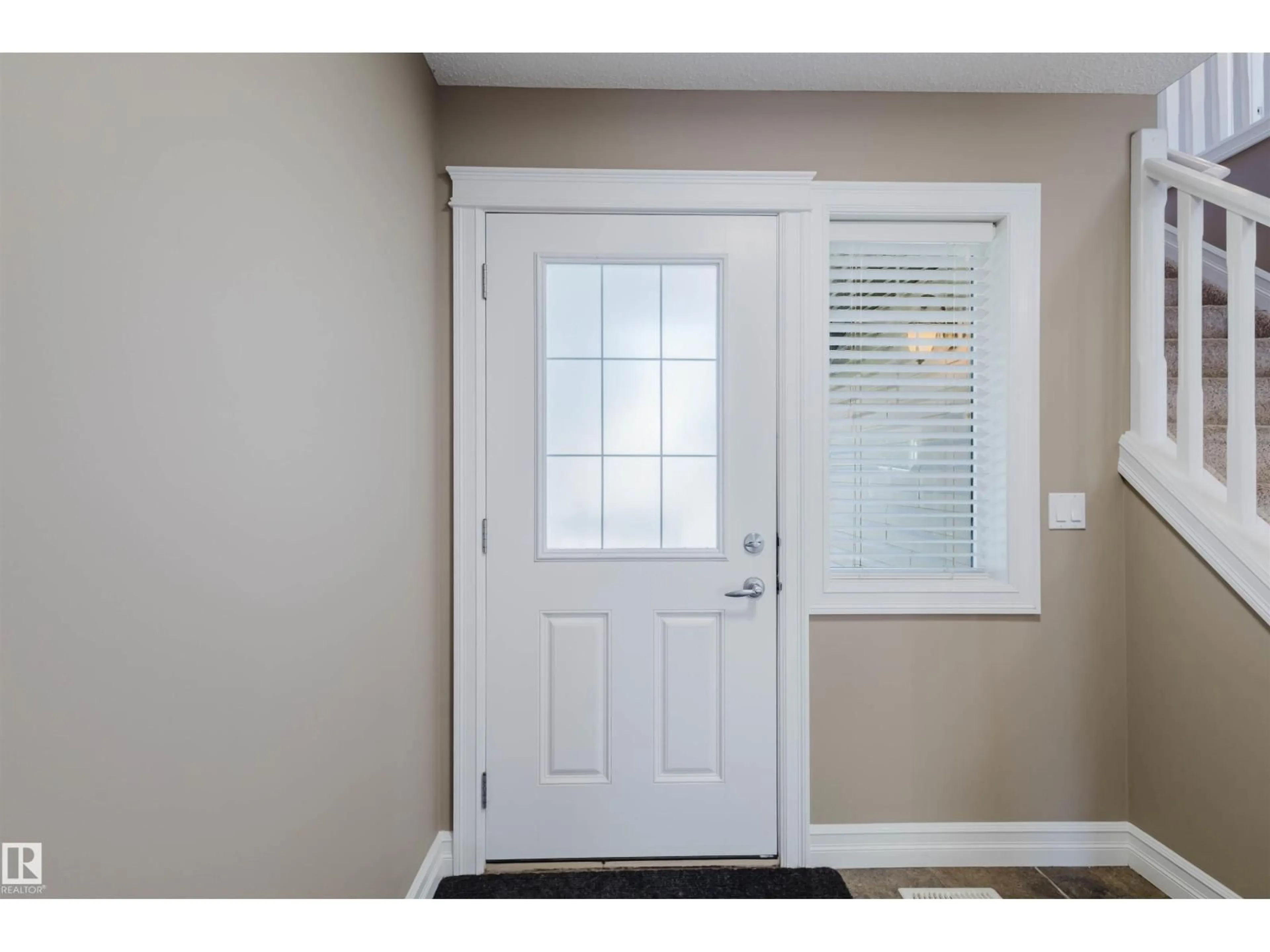 Indoor entryway for 11321 13A AV, Edmonton Alberta T6W0G9