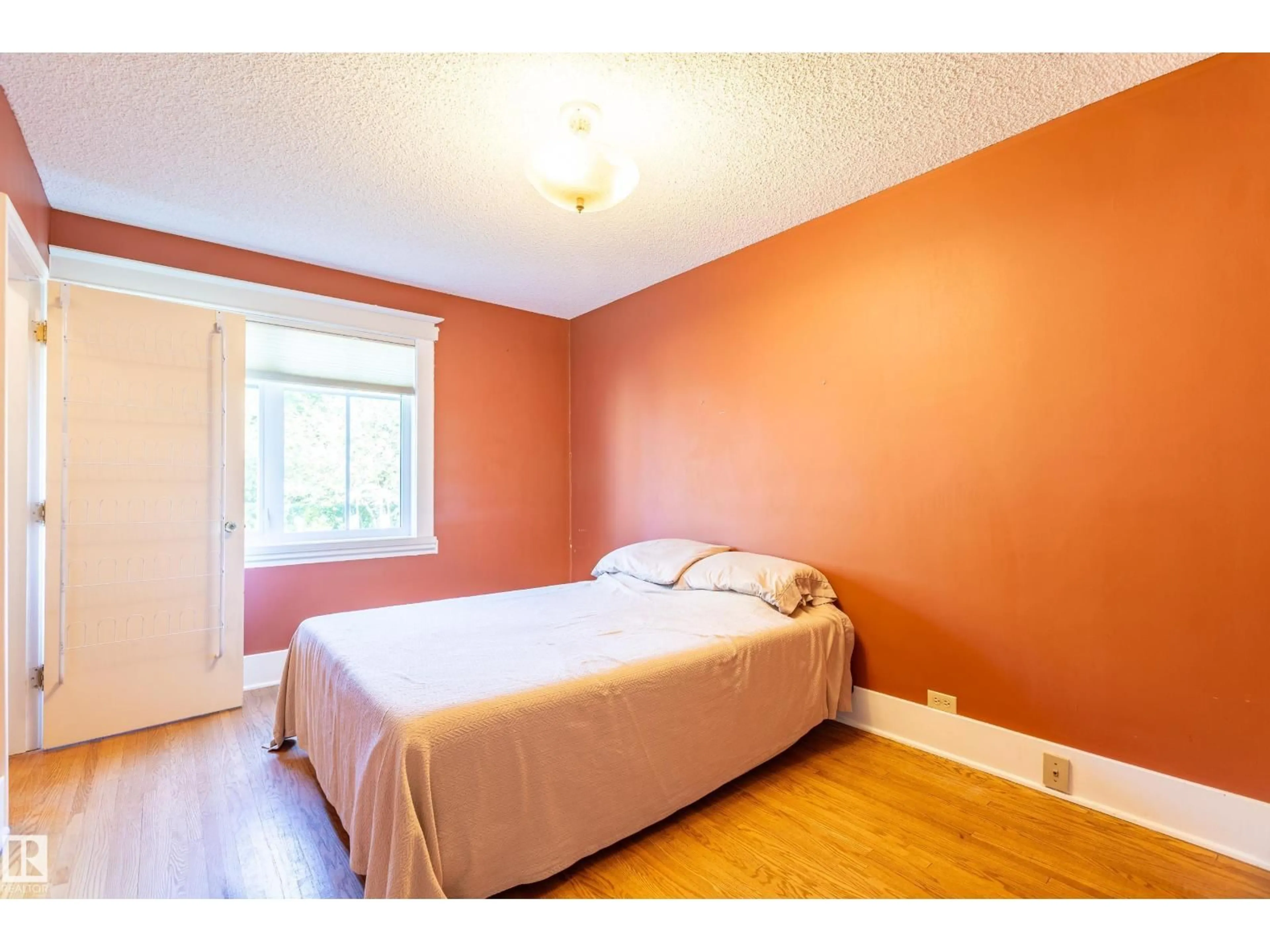 Bedroom with bed, wood/laminate floor for 10016 105 ST, Westlock Alberta T7P1V2