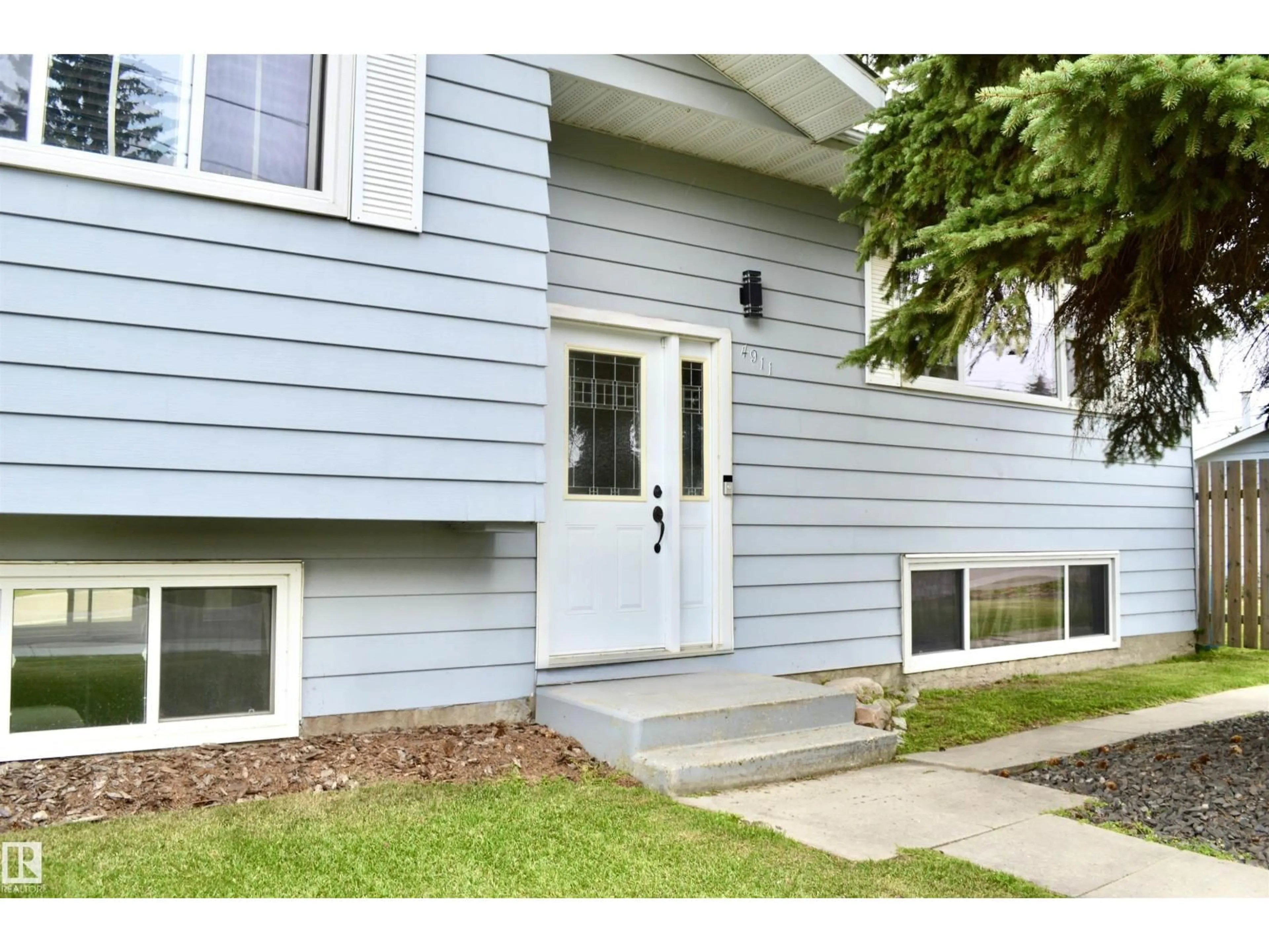 Home with vinyl exterior material, street for 4911 48 AV, Bon Accord Alberta T0A0K0