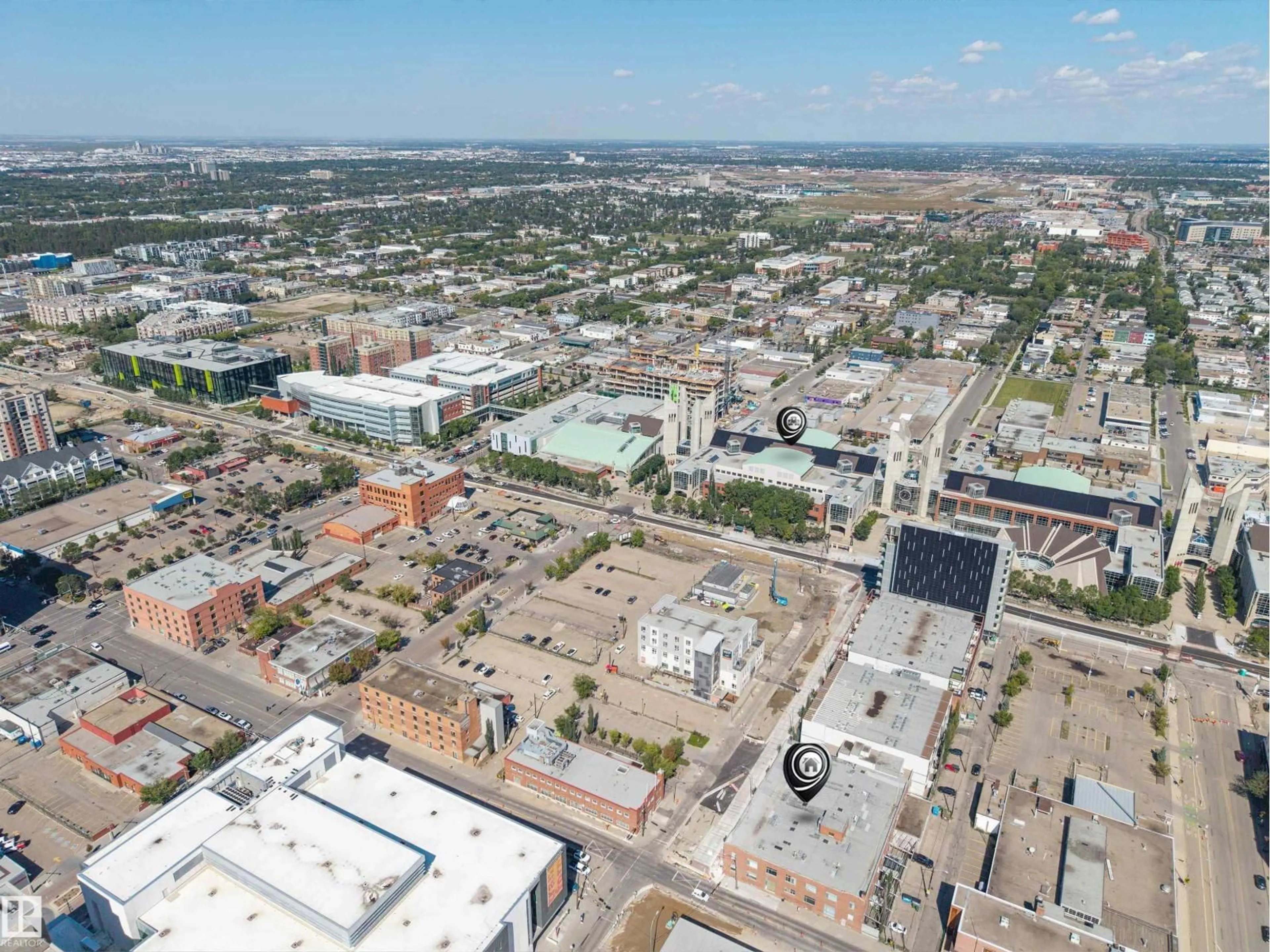 A pic from outside/outdoor area/front of a property/back of a property/a pic from drone, street for #114 - 10309 107 ST NW, Edmonton Alberta T5J1K3